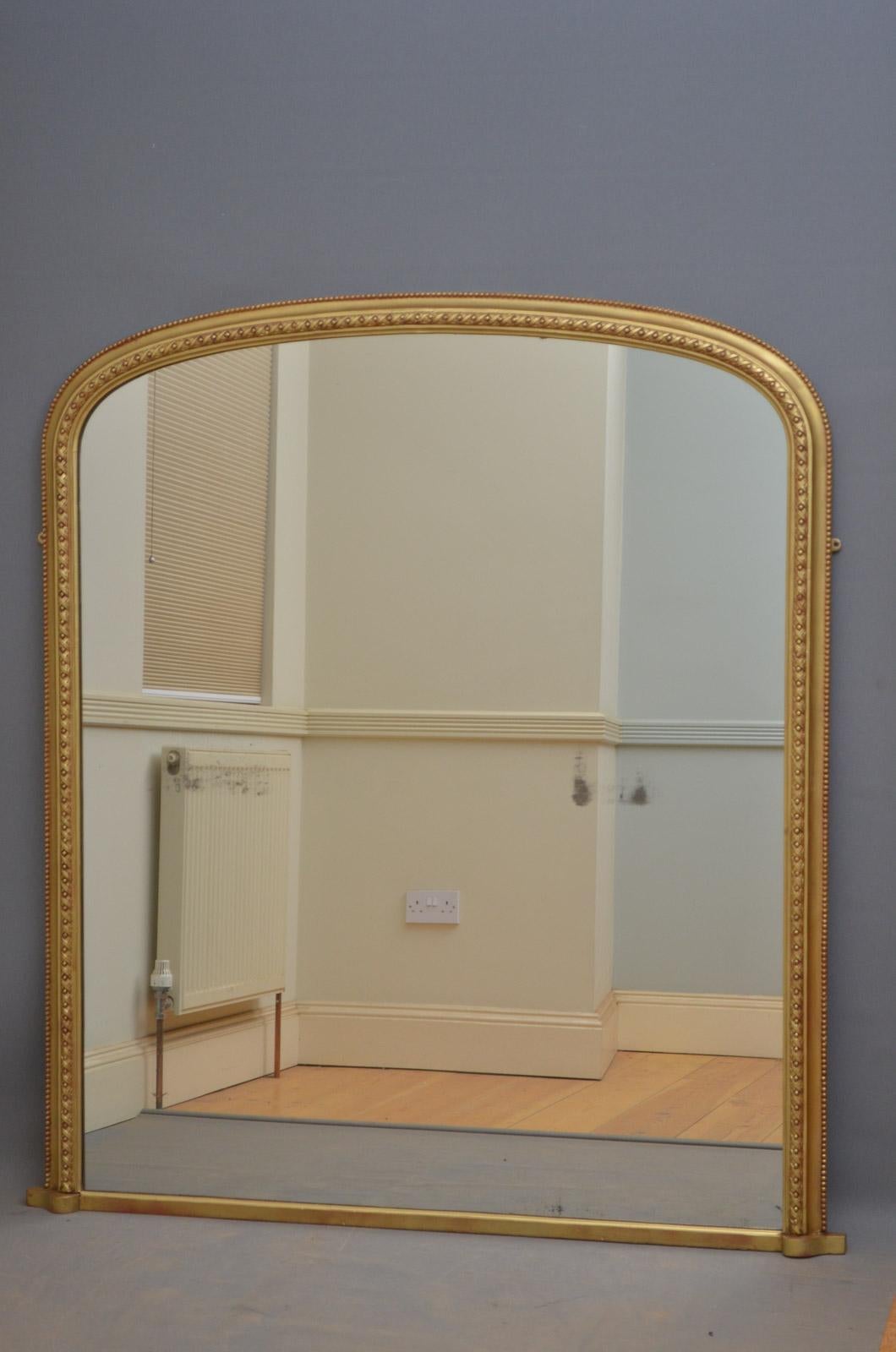 Sn4376 English Victorian overmantle or wall giltwood mirror, having original glass plate with some silvering in finely decorated frame. This antique gilded mirror has been refinished and is ready to place at home, circa 1870.
Measures: H 62.5