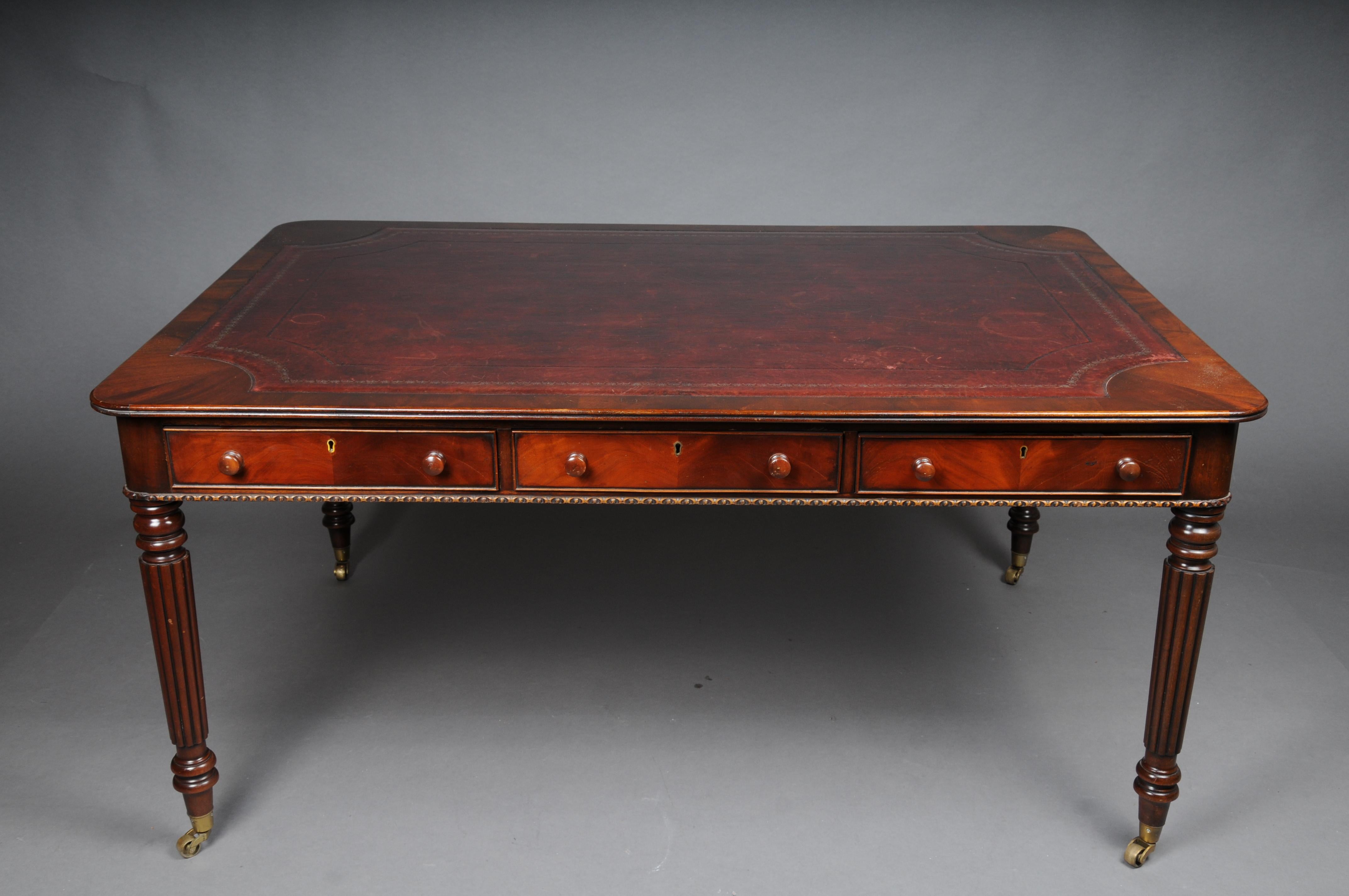 Large Victorian Partner Desk, England, 19th Century, Mahogany with Leather

England, 19th century. Mahogany. Rectangular writing tablet with rounded corners and embossed leather cover. Six frame drawers with double knob handles and lockable drawers.