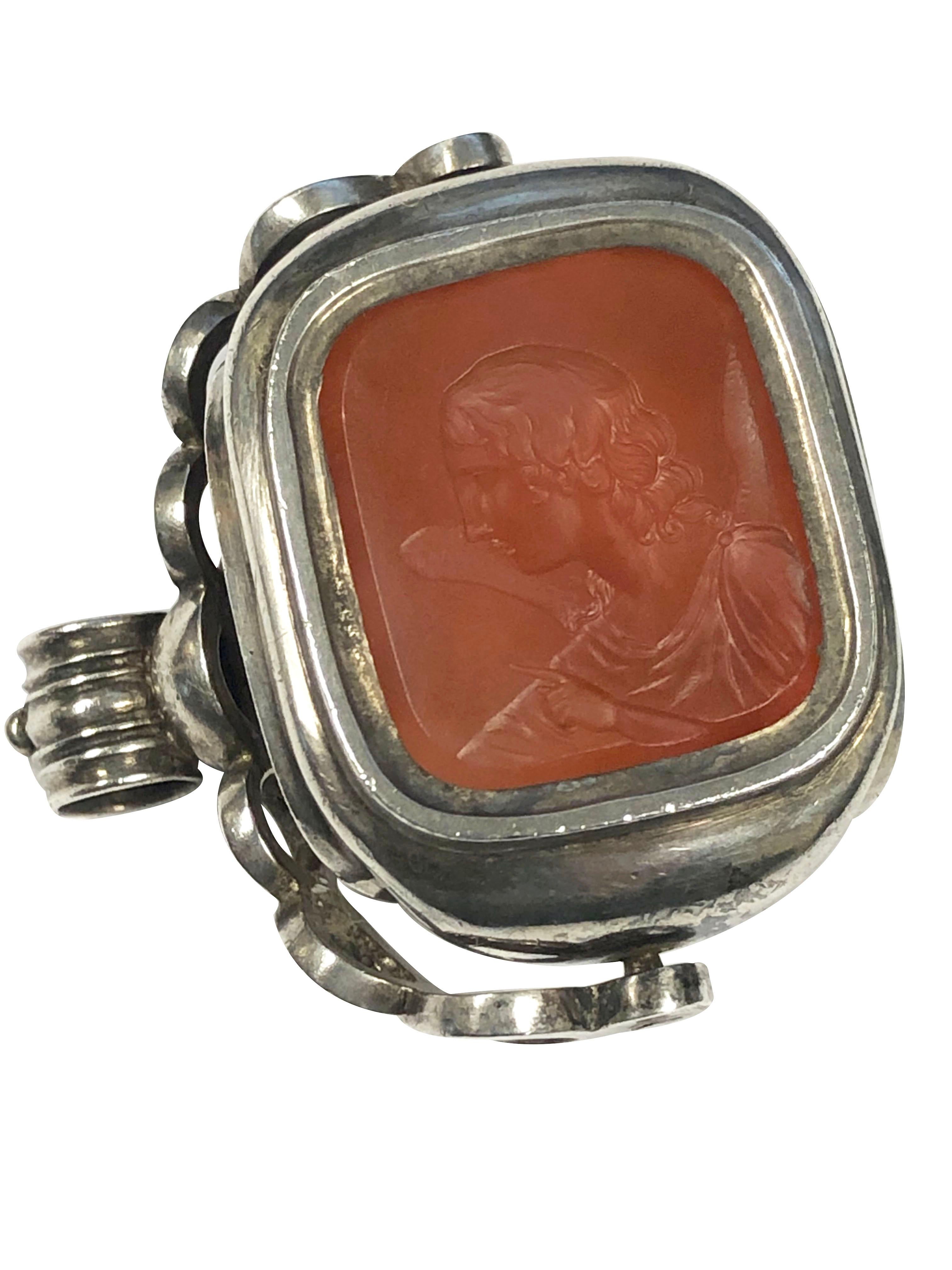 Circa 1840 - 1850 Silver Seal Fob, this triple Fob measures 1 1/2 X 1 1/2 inches,  2 of the Intaglio Seals are Foil Backed Citrine with Depp carved Latin wording and other depictions and the third is Carved Carnelian with a Winged figure. One of the