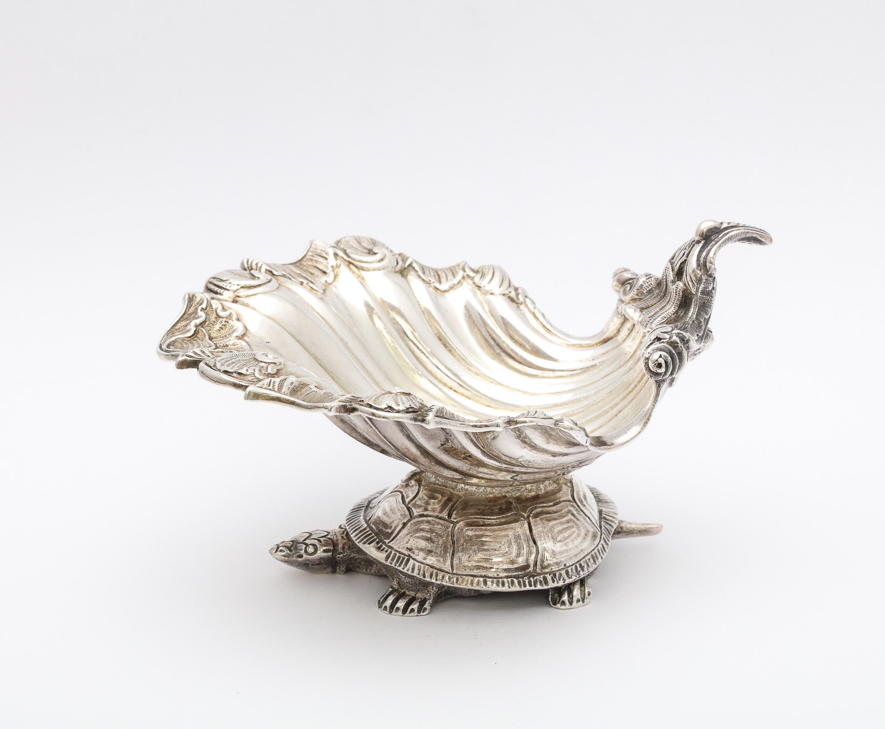 Large, Victorian, sterling silver salt cellar (that can be used as a sauce dish or trinkets dish) J.E. Caldwell and Co., Philadelphia, Pennsylvania, Ca. 1895. Salt cellar is in the form of a turtle as its base carrying a seashell on its back.