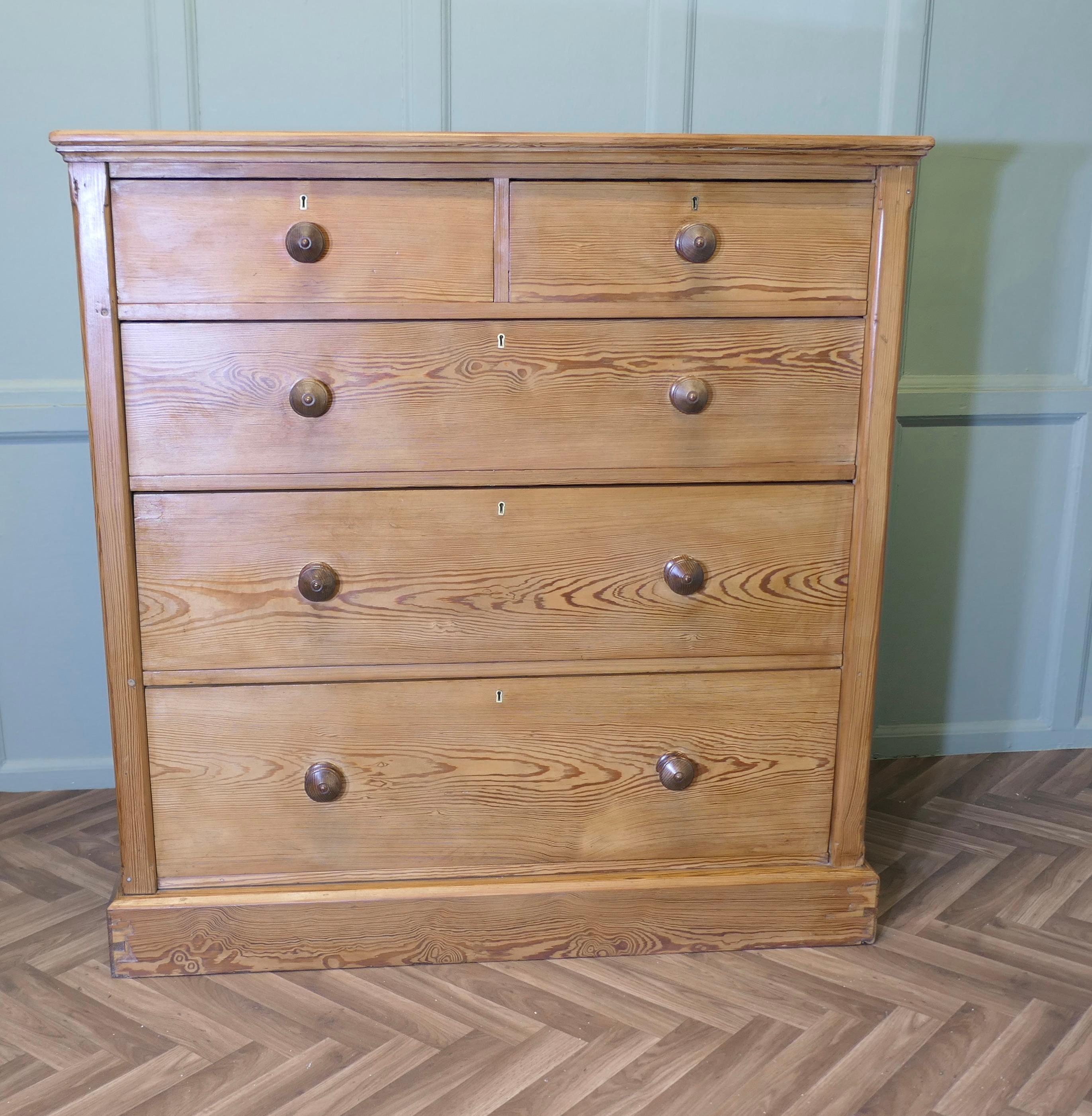 Large Victorian Stripped Pine Chest of Drawers

A Large Victorian Pitch Pine chest of drawers dates from around 1890 it has been stripped and waxed.
This is a good quality pine chest, the chest has a moulded edge to the top and stands on a plinth,