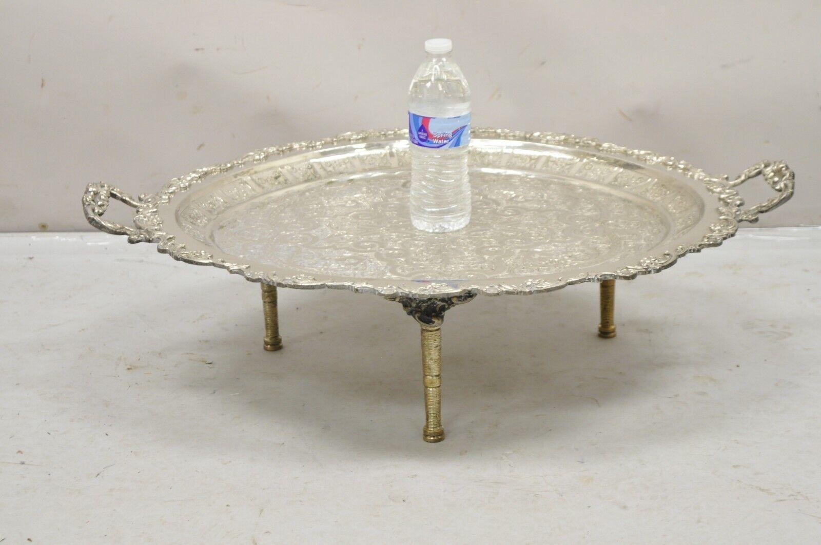 Large Victorian Style Oval Silver Plated Serving Platter Tray on Raised Feet. Item features removable tapered legs, ornate designed tray, shell form handles, large impressive size, original hallmark, believed to be Indian Circa Mid to 20th Century.