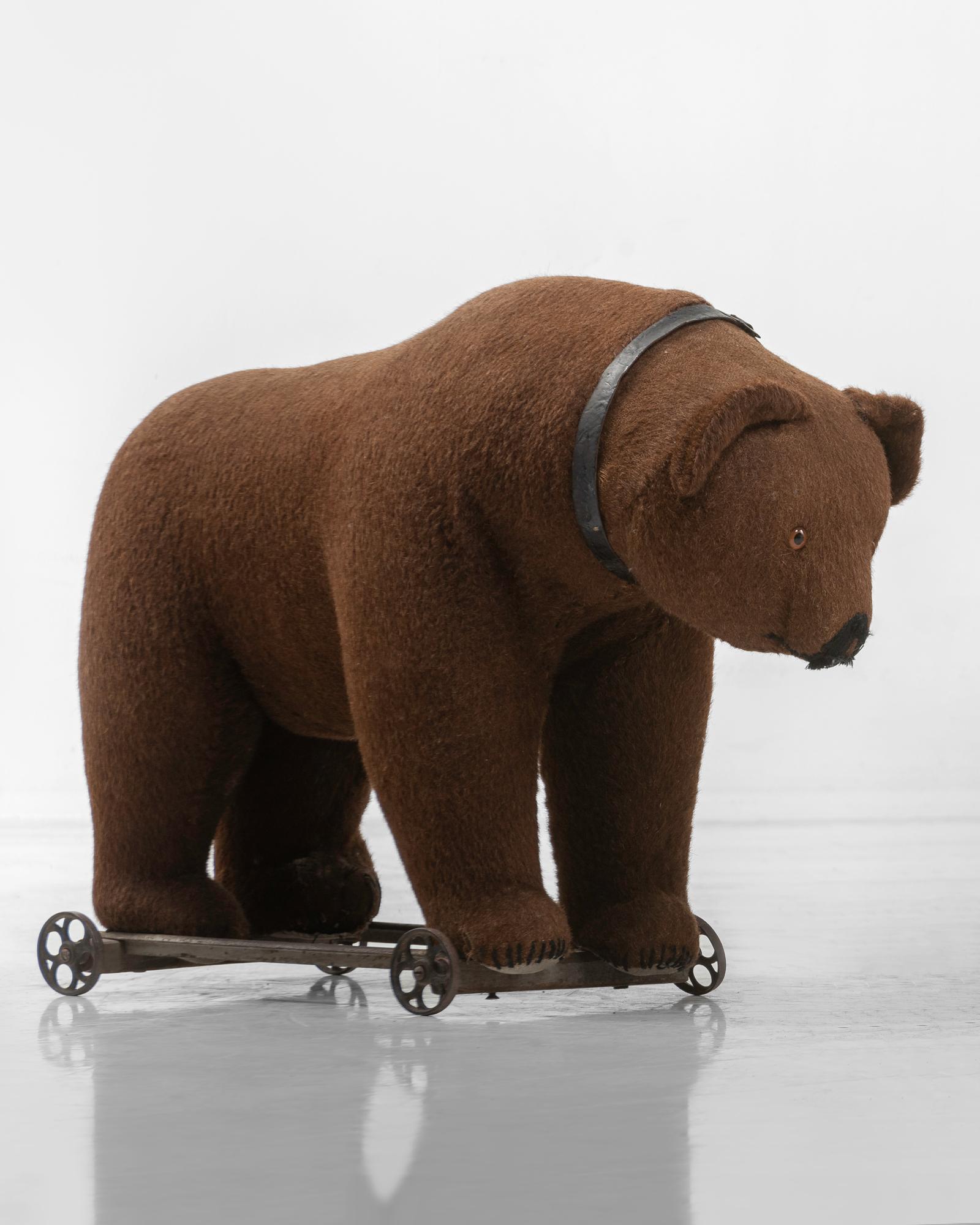 Large Victorian toy bear pull ride, circa 1900

Plush toy bear on wheels to be pulled or pushed.