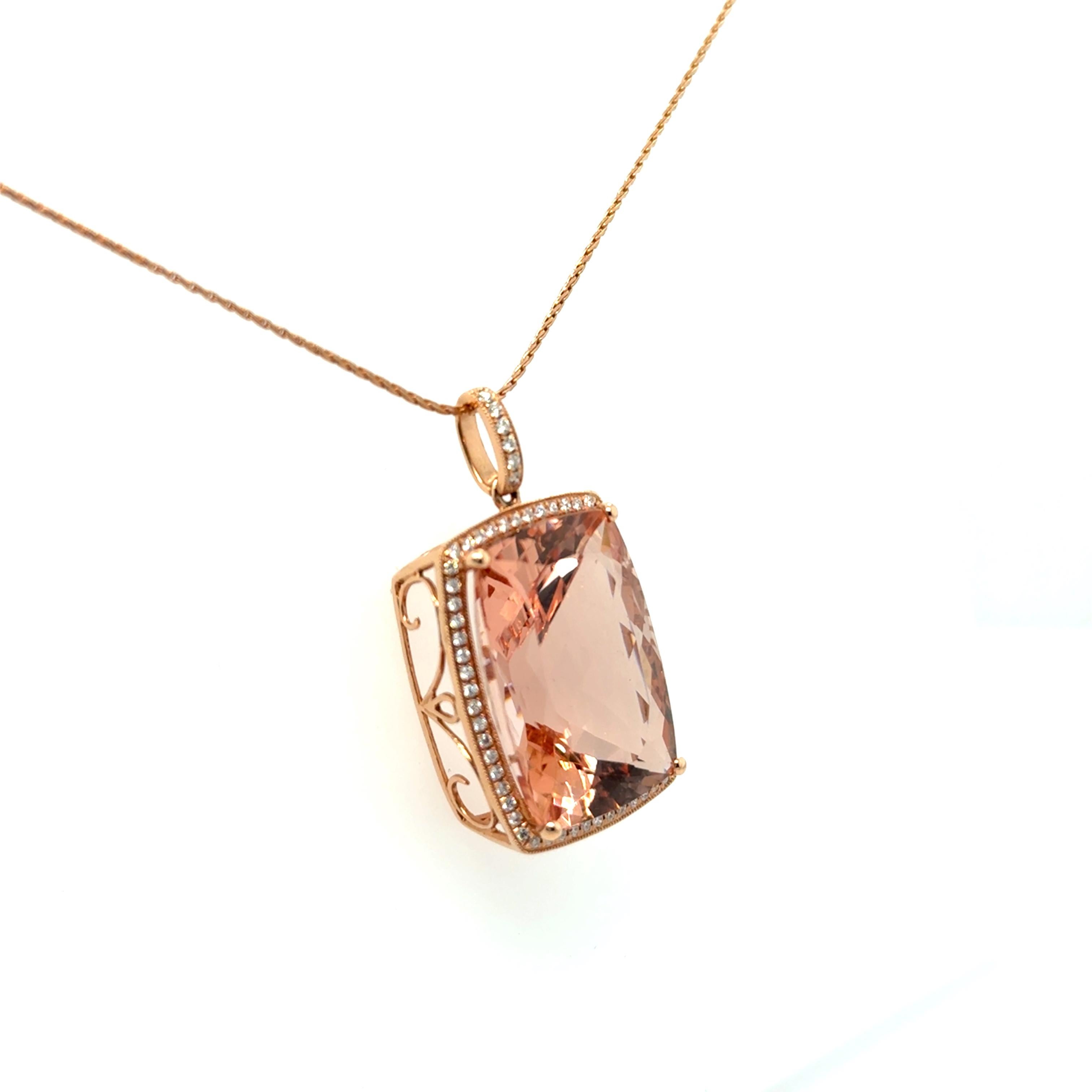 LOVE the simple elegance of this beauty! Crafted in 14K Rose gold, the necklace features a Natural Morganite Gemstone in a classic Basket setting, with lovely scroll work in the basket, surrounded by a Halo of Diamonds, and on a beautiful chain. In
