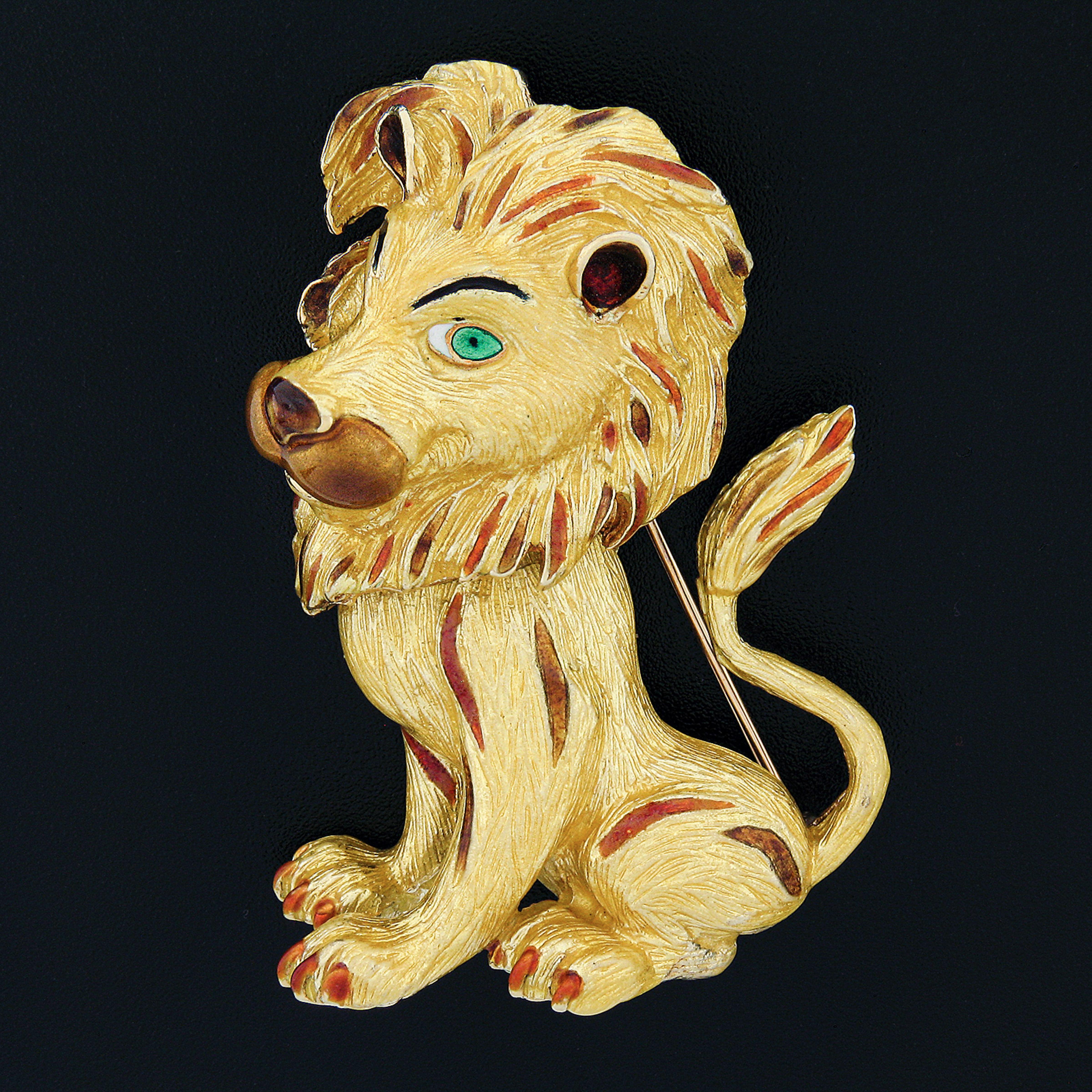 This magnificent vintage brooch/pin is crafted in solid 18k yellow gold and features a perfectly structured cartoony lion design with unique, and remarkably outstanding workmanship and texture that bring out maximum detailing granting an exceptional
