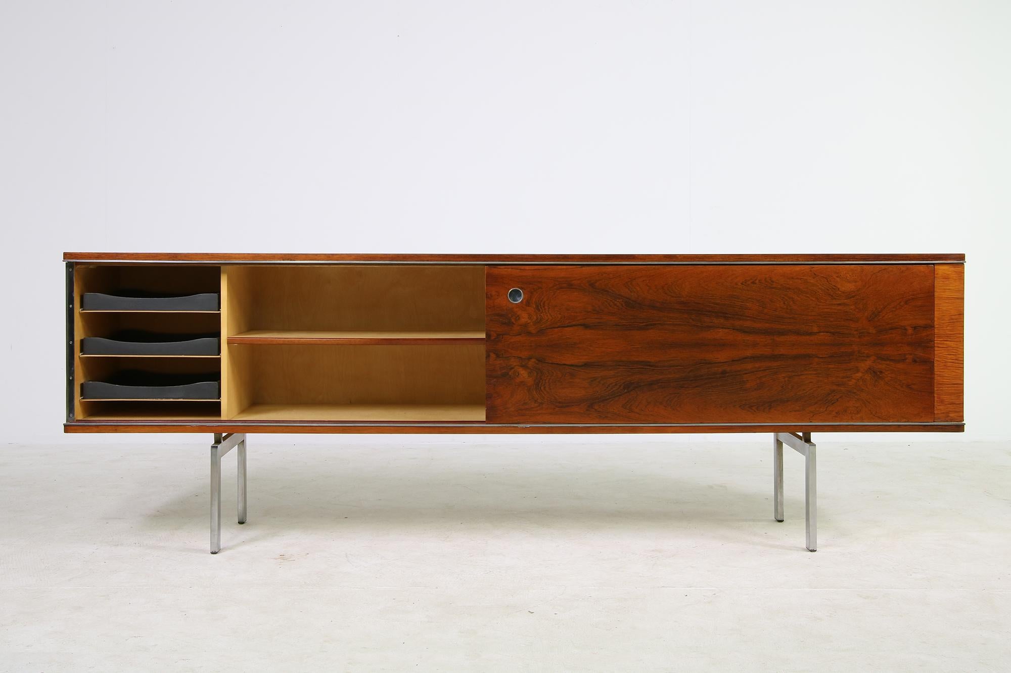 Great and large sideboard, Belgium or Netherlands, 1960s with a metal base, very detailed design and metal accents, the sliding doors are reversible, beautiful vintage piece with beautiful wood structure, colors and patina. The wood should be