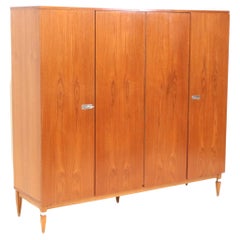 Large vintage 4-door wardrobe made of teak from the 1960s