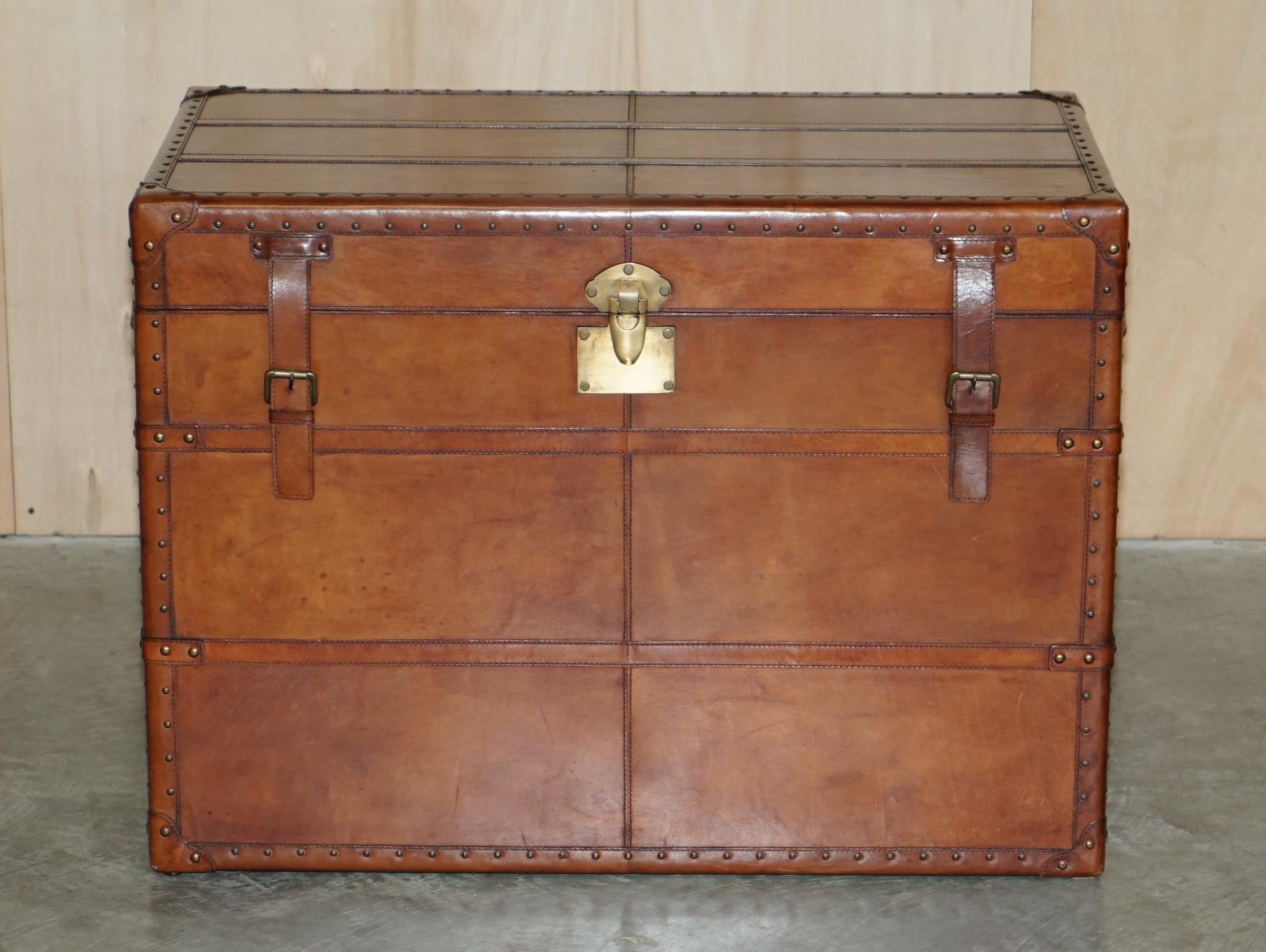 We are delighted to offer for sale this lovely vintage brown leather steamer storage trunk or chest.

A good looking and very decorative chest, ideally suited for storing linens or as a coffee table, I can have a glass top made if the new owners