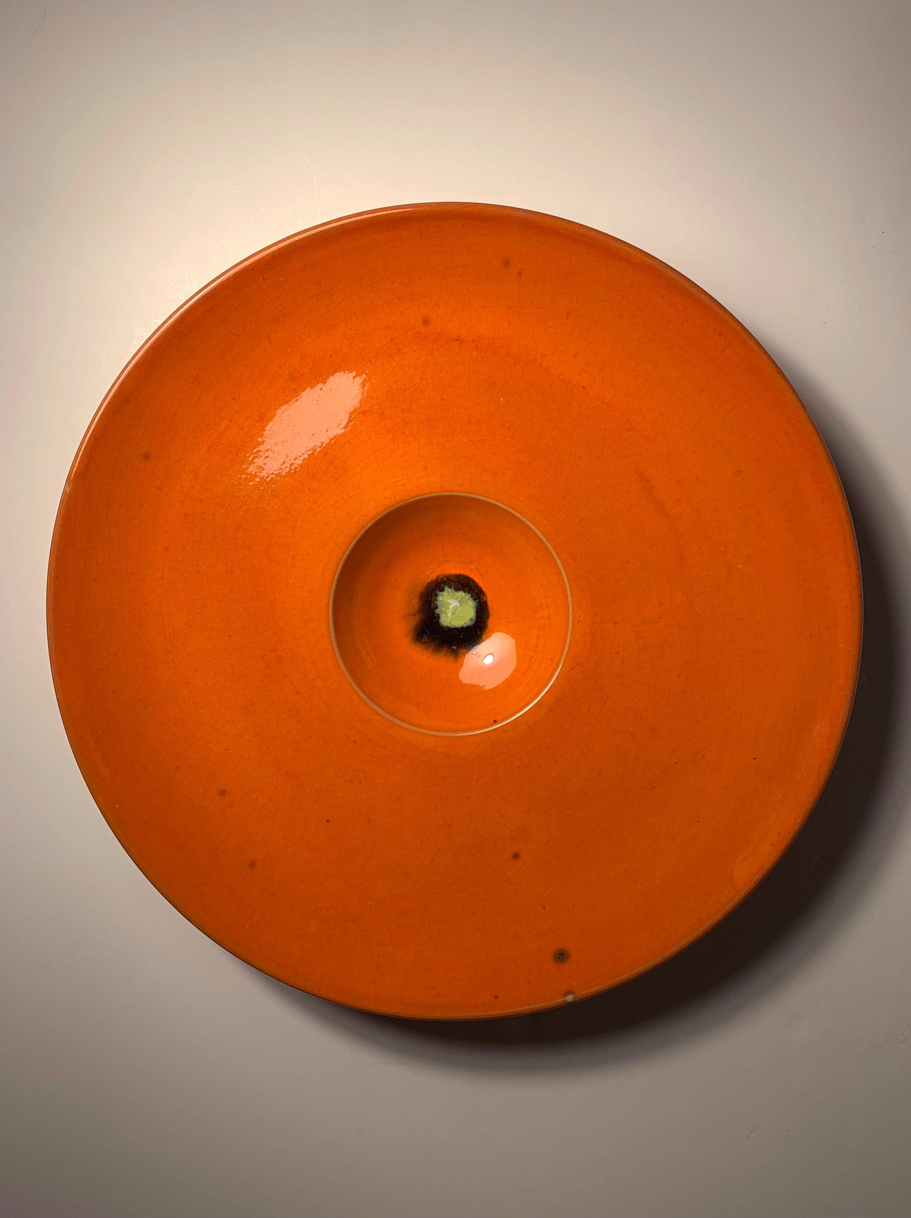 A large artist studio ceramic charger by Bjorn Wiinblad.  Nice as a Table ornament or possibly mounted as a wall art.

some minor loss/crackling  to glaze in the center (as shown). 
