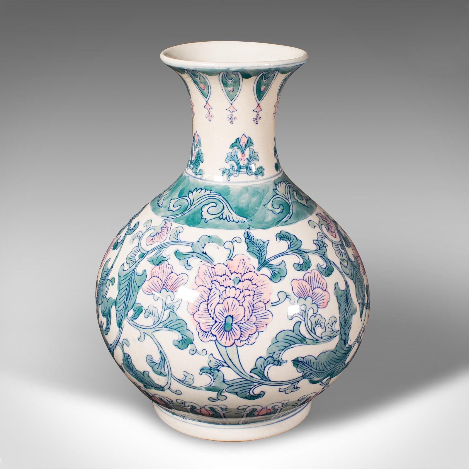 This is a large vintage baluster vase. A Chinese, ceramic flower pot, dating to the late 20th century in Art Deco revival taste, circa 1970.
 
Appealing decorative vase in Oriental Art Deco taste
Displays a desirable aged patina and in good