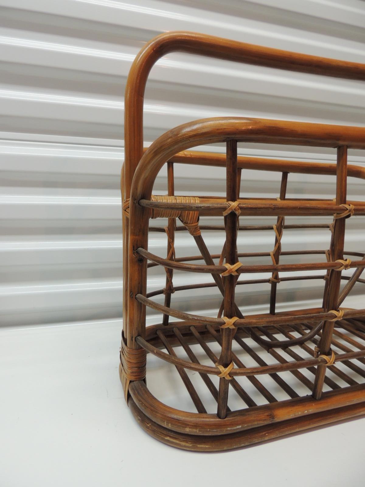 Large vintage bent bamboo magazine rack or bookstand with handle
Woven design with details in rattan in the middle divider
Size: 20