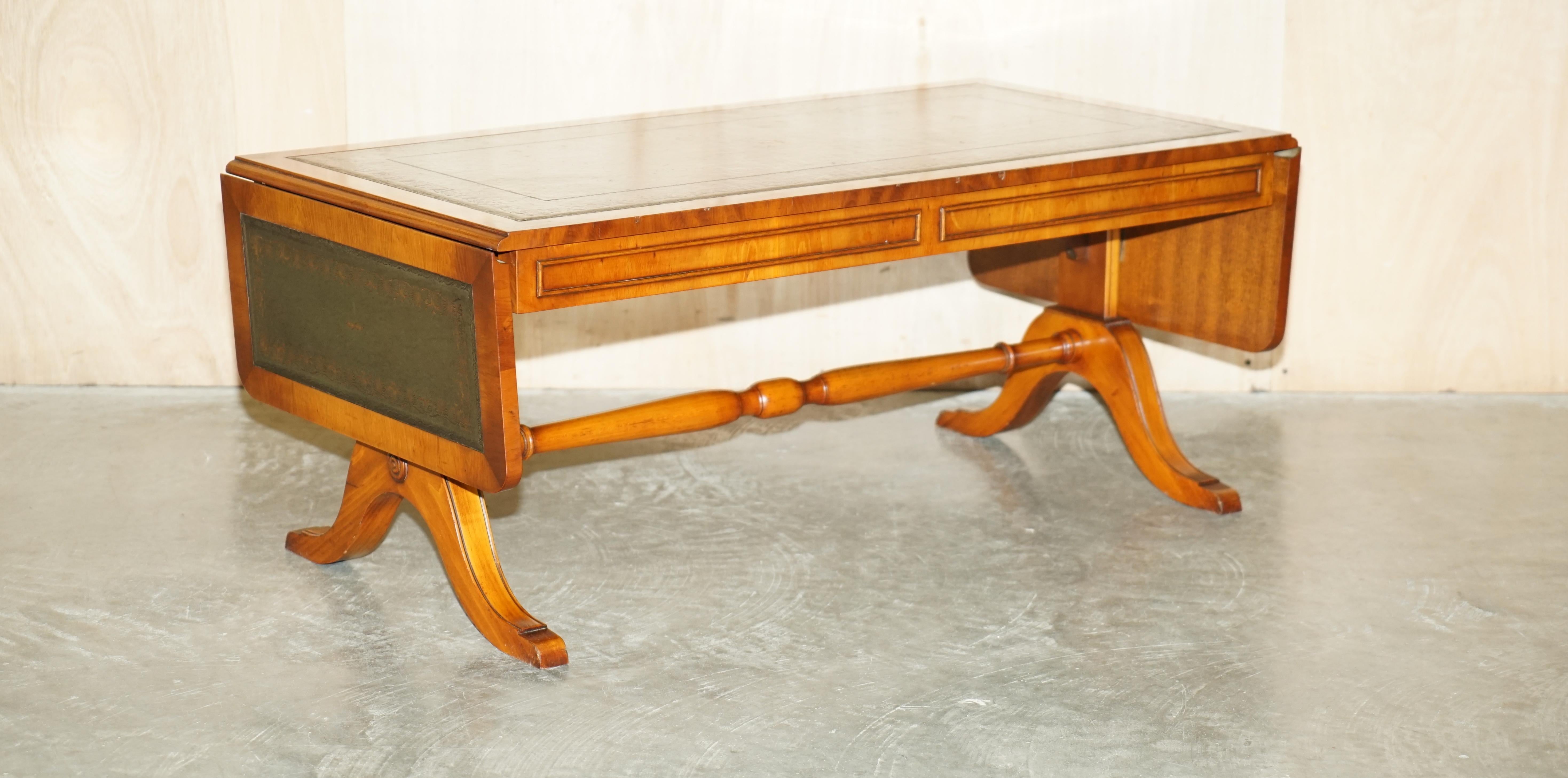 We are delighted to offer for sale this lovely condition Bevan Funnell yew wood green leather large extending coffee table.

This is a very well made and versatile piece with a lovely timber patina and stunning Regency style green leather