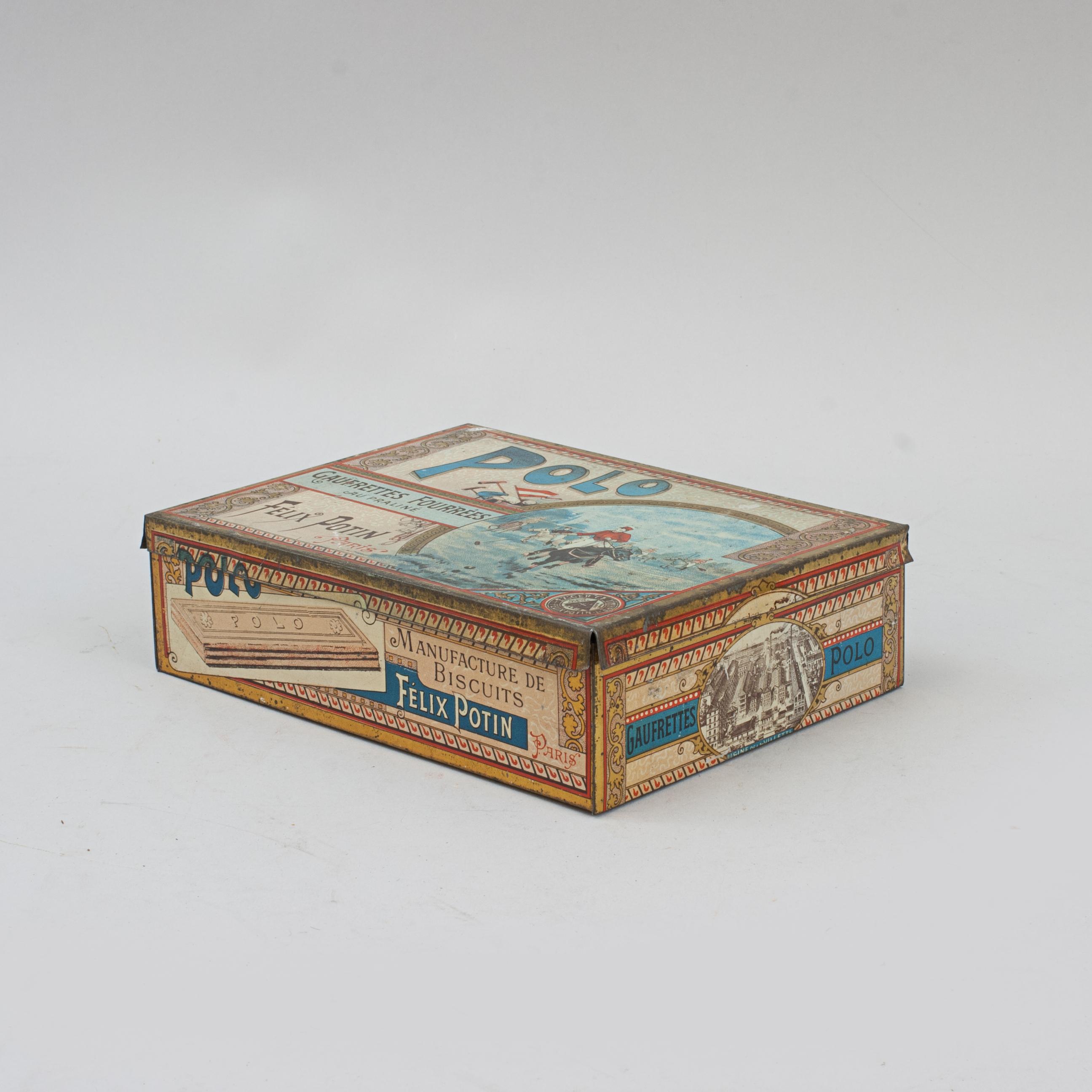 Vintage Félix Potin Biscuit Tin With Polo Scenes.
A delightful vintage French biscuit tin for Félix Potin's praline filled wafers. The front of the tin with a scene of a polo match, to the side an image of polo equipment, mallets, ball, caps, flags