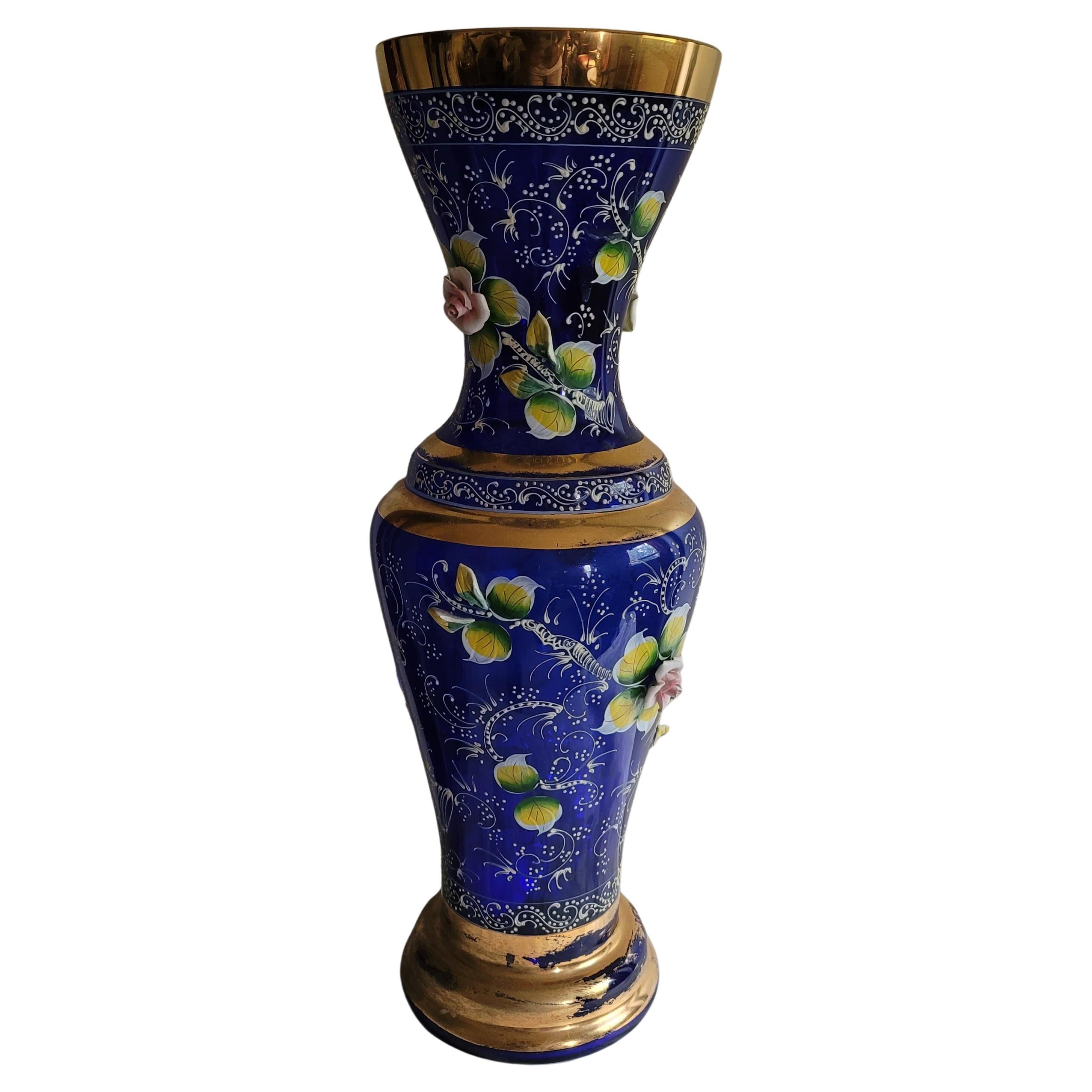 Large Vintage Bohemian Cobalt Blue Gilt and Enameled Art, raised flowers , Hand Painted Glass Vase.
Measures 8