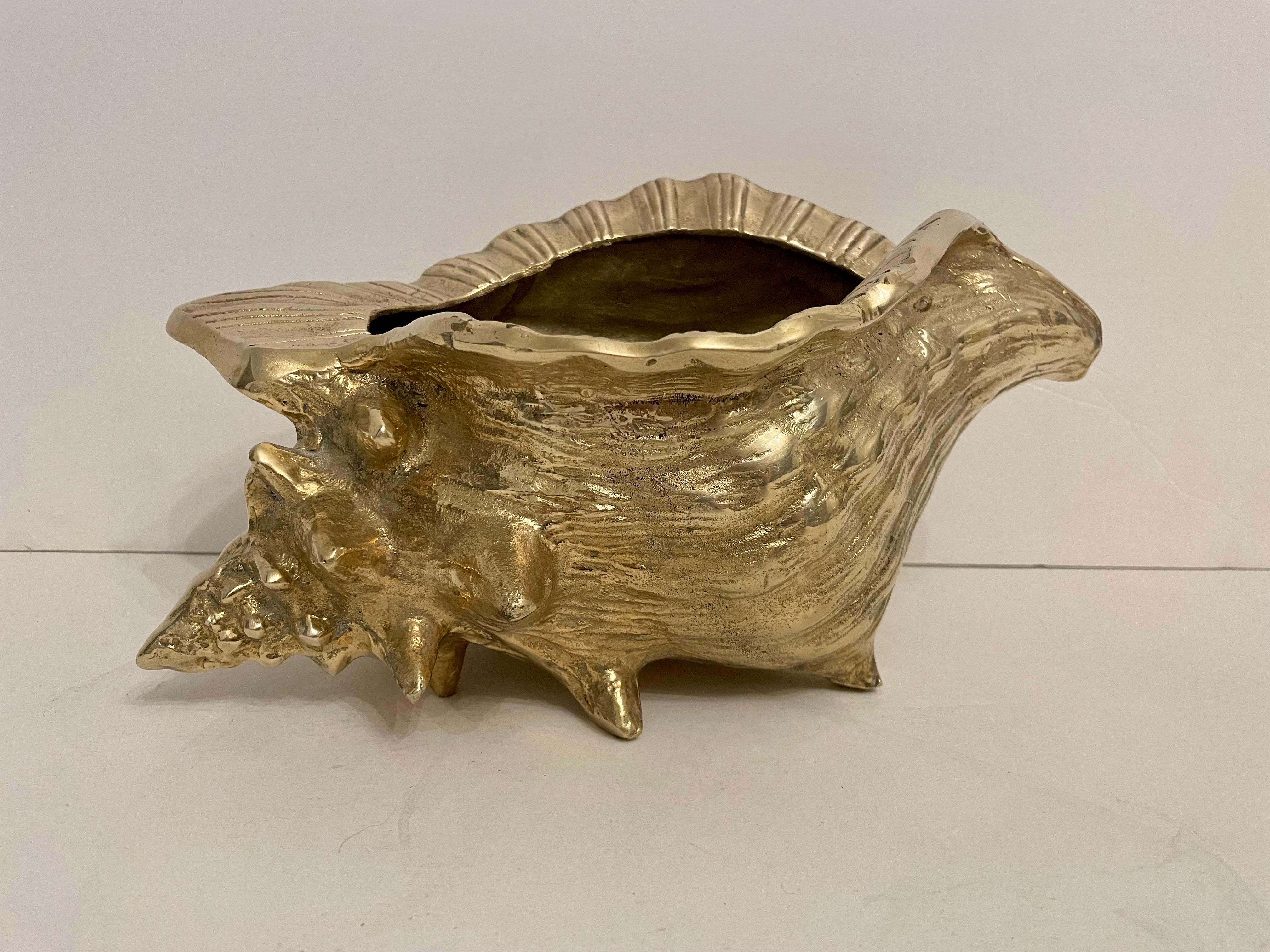 Very large vintage brass seashell nautilus planter. Very detailed. Good overall condition, hand polished. Can be used  inside or out. Measures an impressive 11