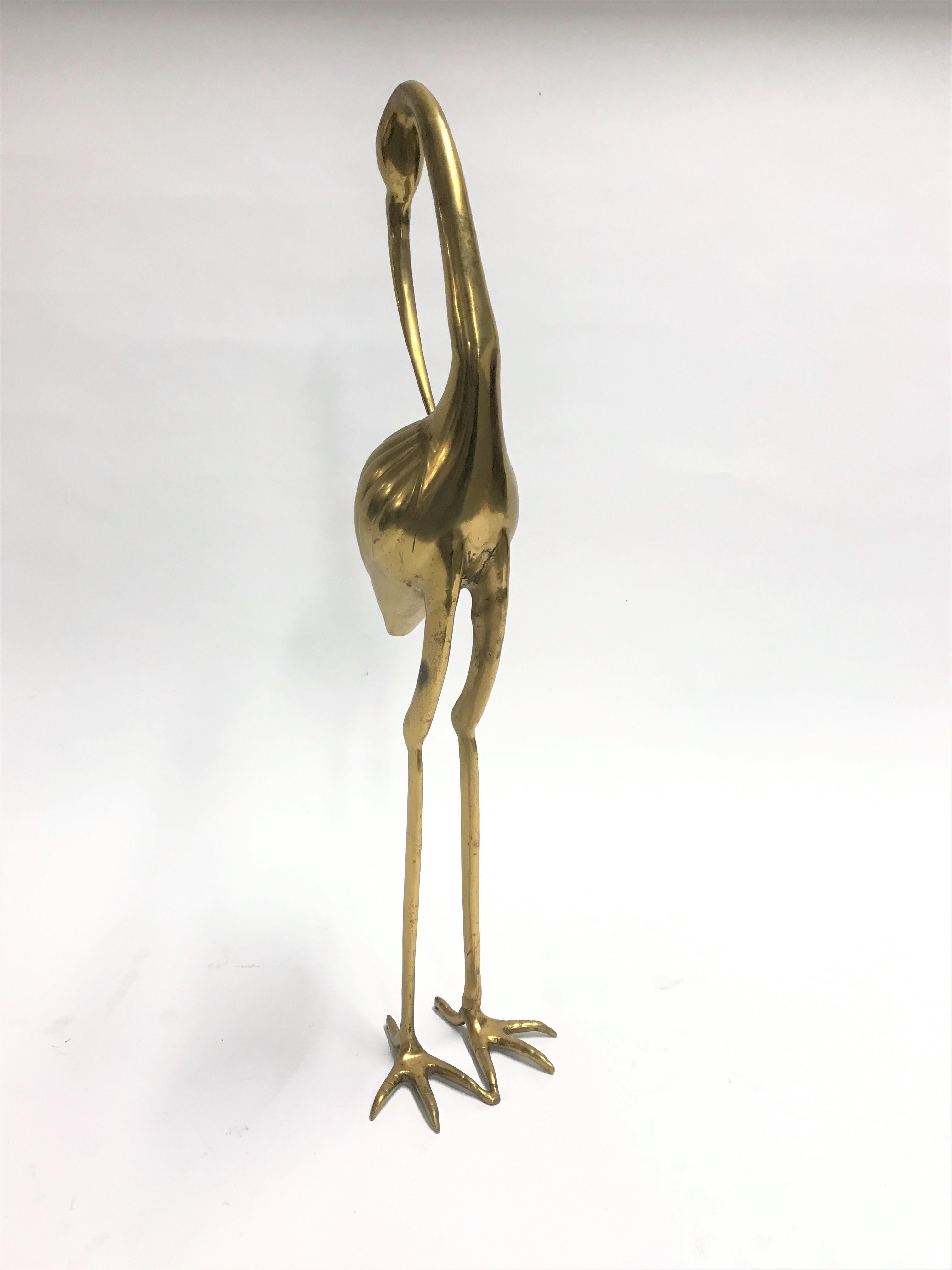 Large midcentury brass crane bird sculpture.

Good original condition, slightly patinated which adds to the charm.

Heavy quality item.

1970s - France

Good condition.

Dimensions:
Height 83cm/32.5”.

 
 