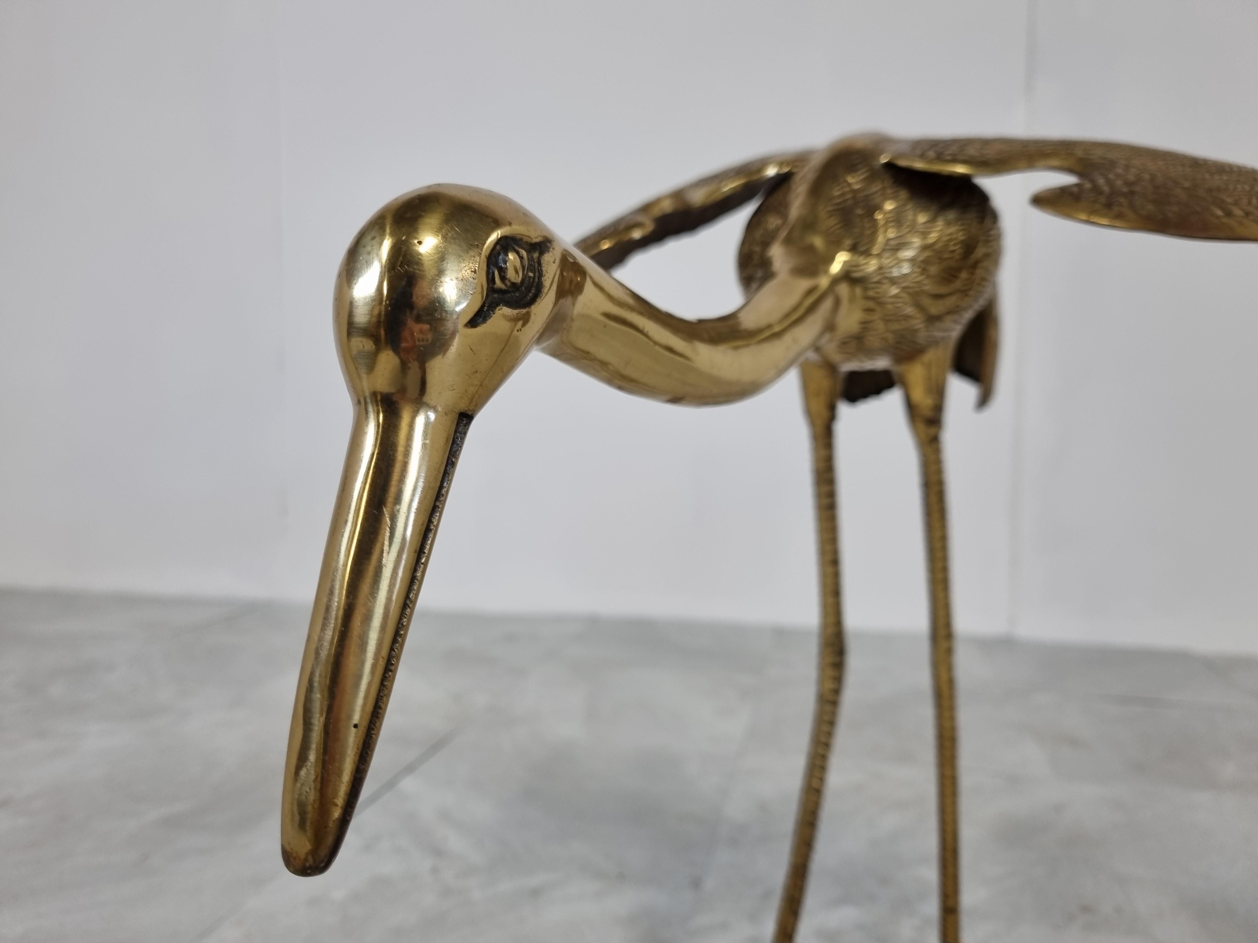 Large mid century brass crane bird sculptures, set of two.

Good condition with nice details.

1970s - France

Good condition.

Dimensions:
Height of the largest bird is 73cm

Price is for the pair.

 