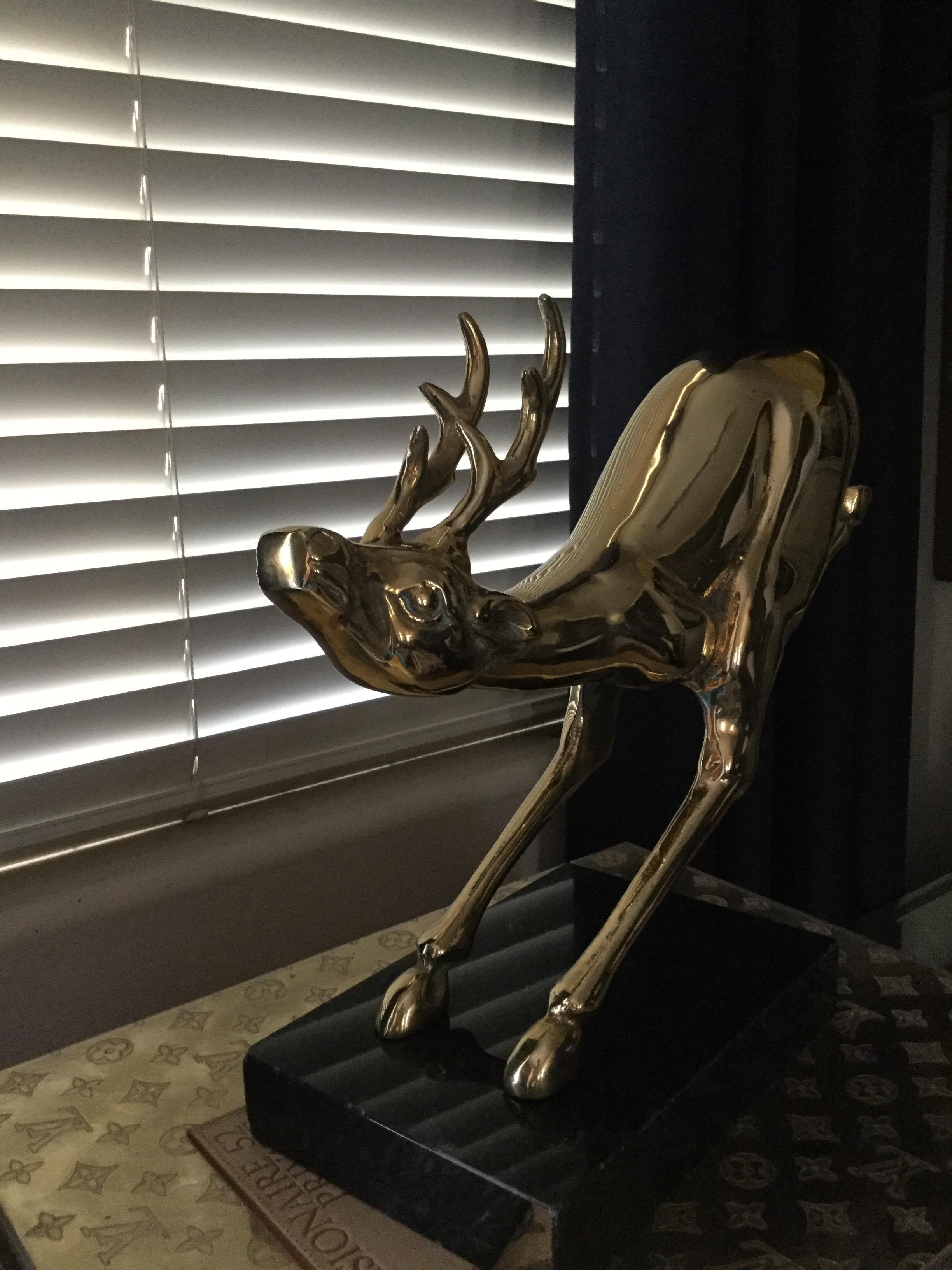 brass sculpted reindeer