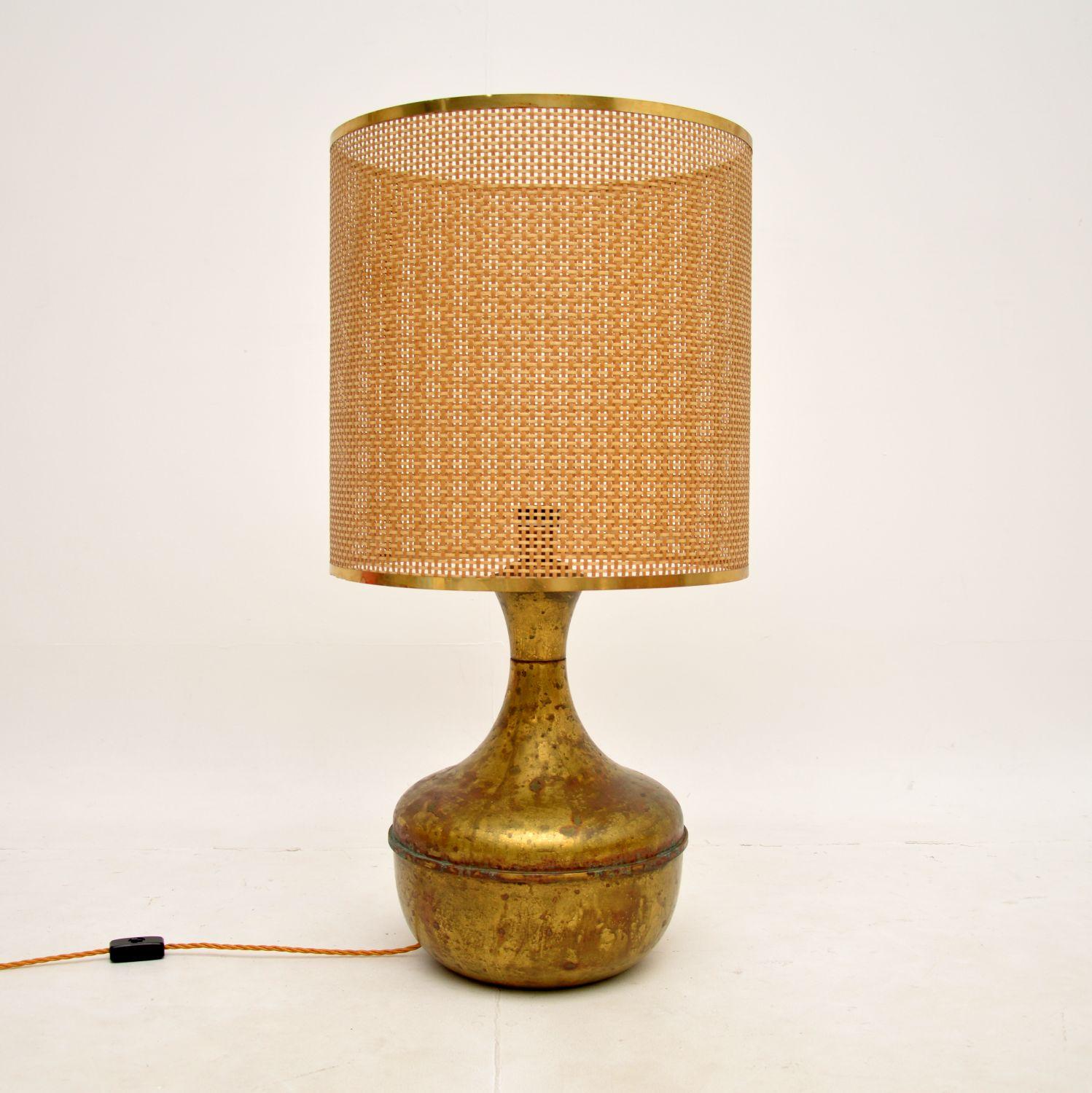 A beautiful and very impressive large vintage brass table lamp. This was made in England, it dates from around the 1960’s.

The beaten brass is beautifully aged and has an amazing patina, showing just the right amount of wear. The lamp came with