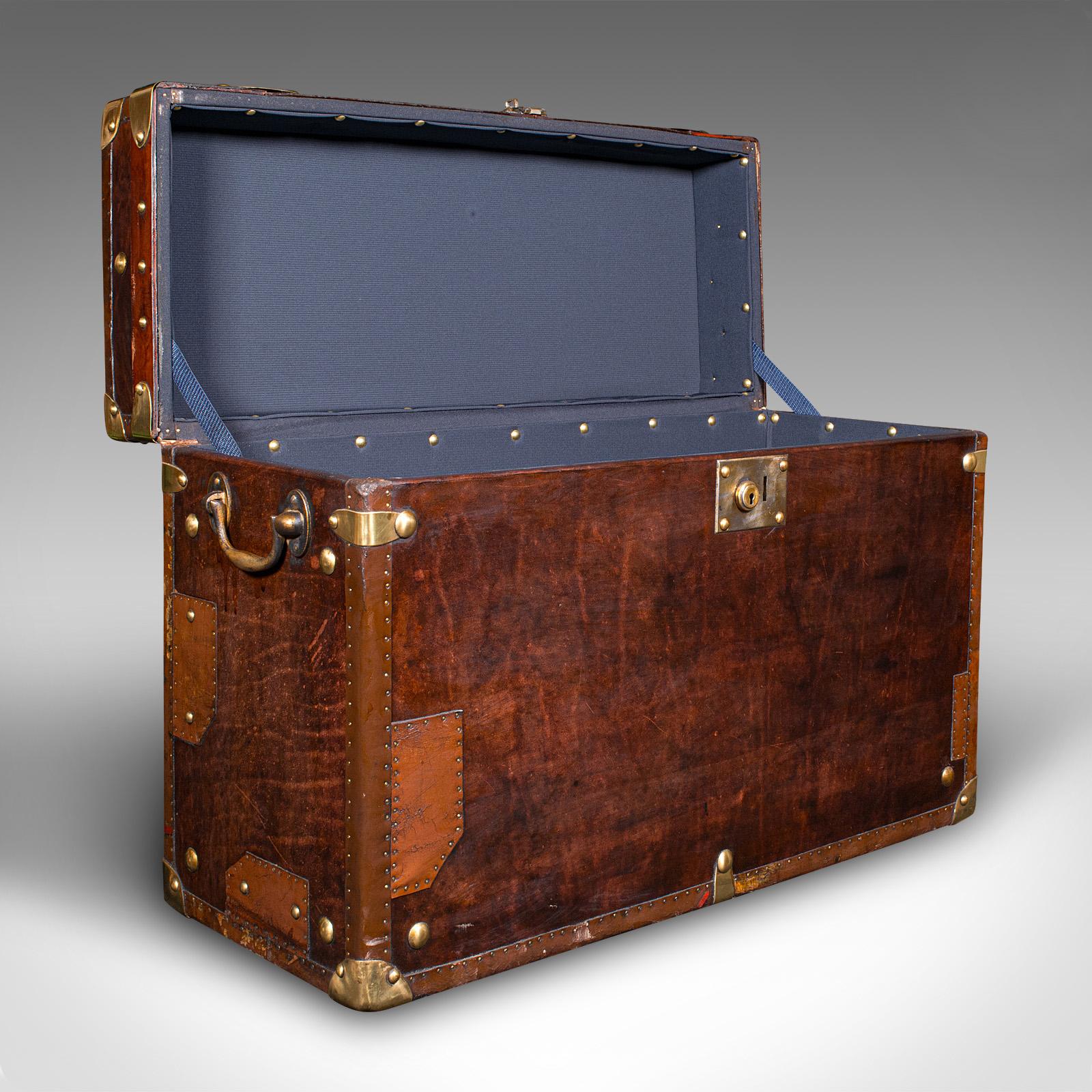 This is a large vintage campaign luggage case. An English, leather and brass bedside nightstand, dating to the late 20th century, circa 1990.
 
Wonderful craftsmanship, adding a touch of distinction to your luggage
Displaying a desirable aged patina