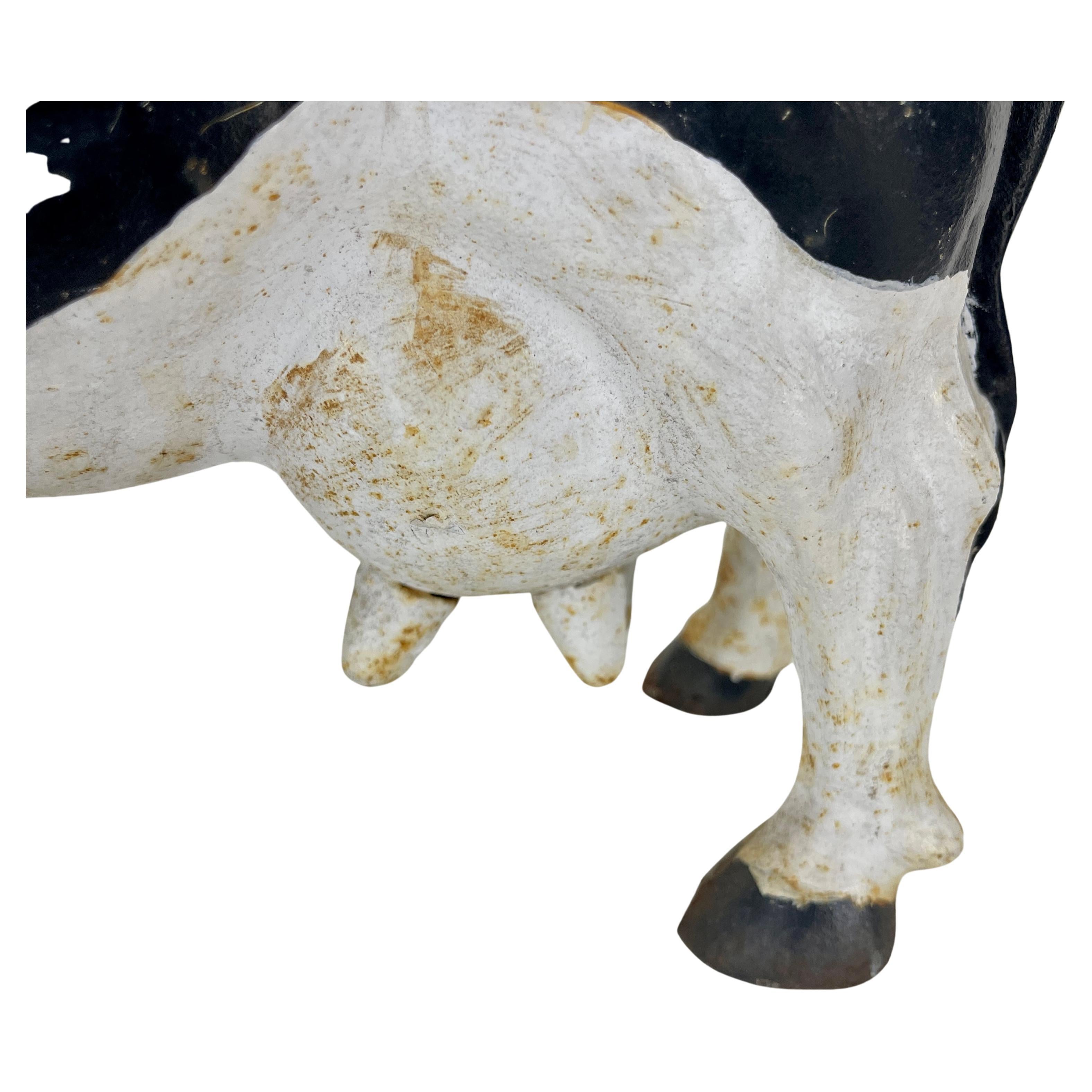 Grande tirelire vintage en fonte noire et blanche vache cochonne 1