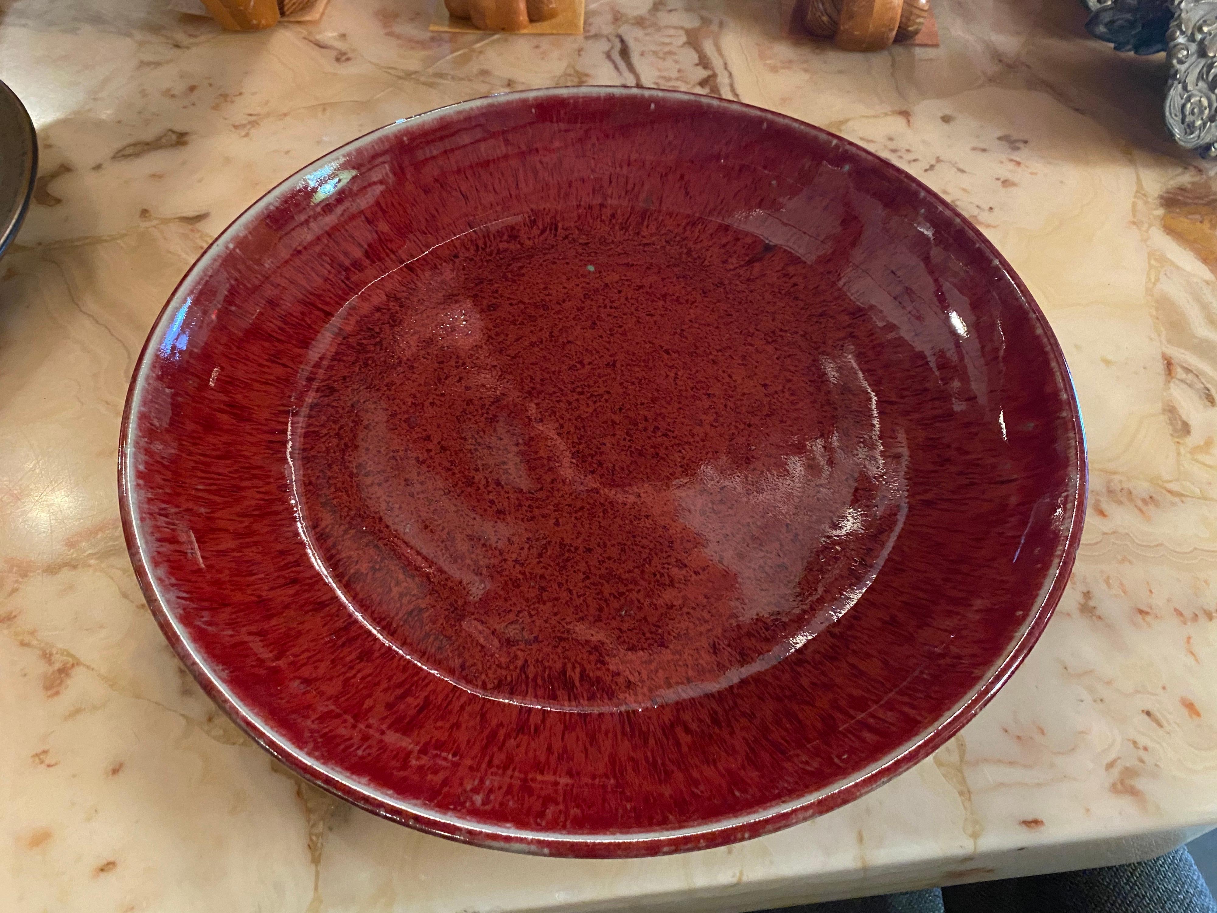 Stunning large mid-century ceramic decorative bowl by Texas Ceramist Harding Black made in 1951 features a beautiful glaze. This vintage ceramic piece is in great overall condition.