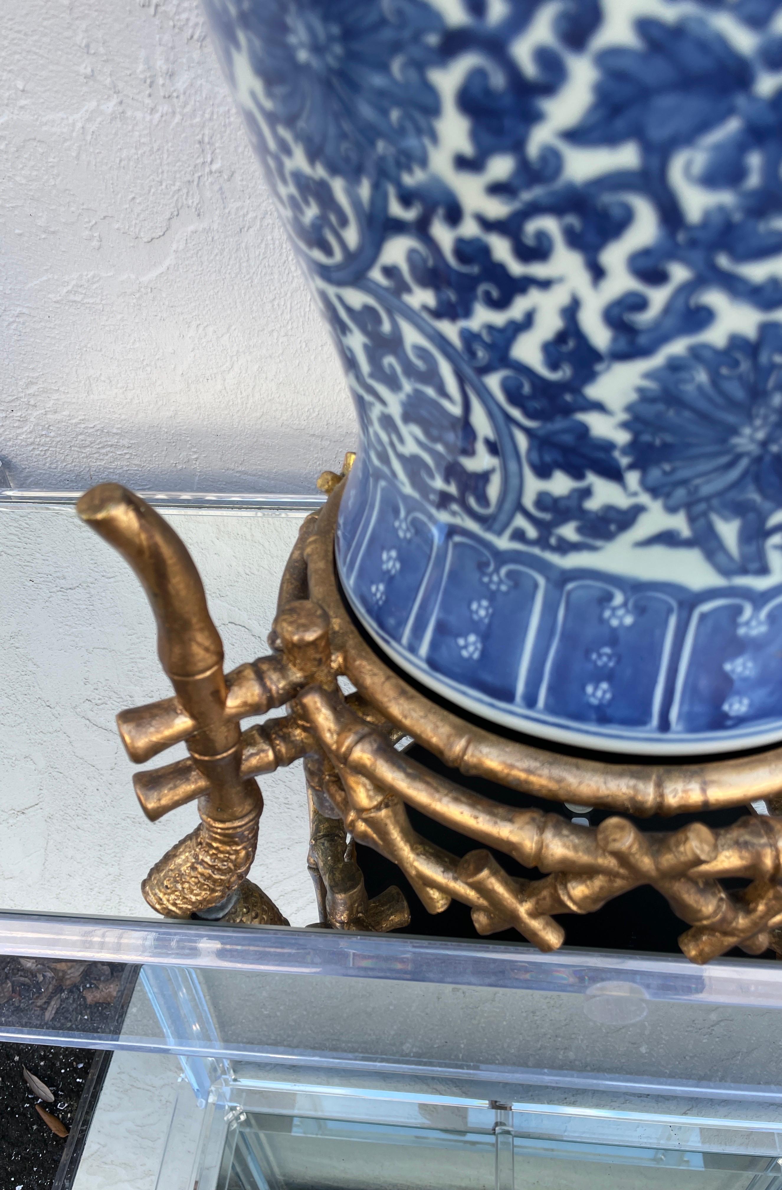 Large vintage Chinese blue & white ginger jar on gilded chinoiserie faux bamboo stand.