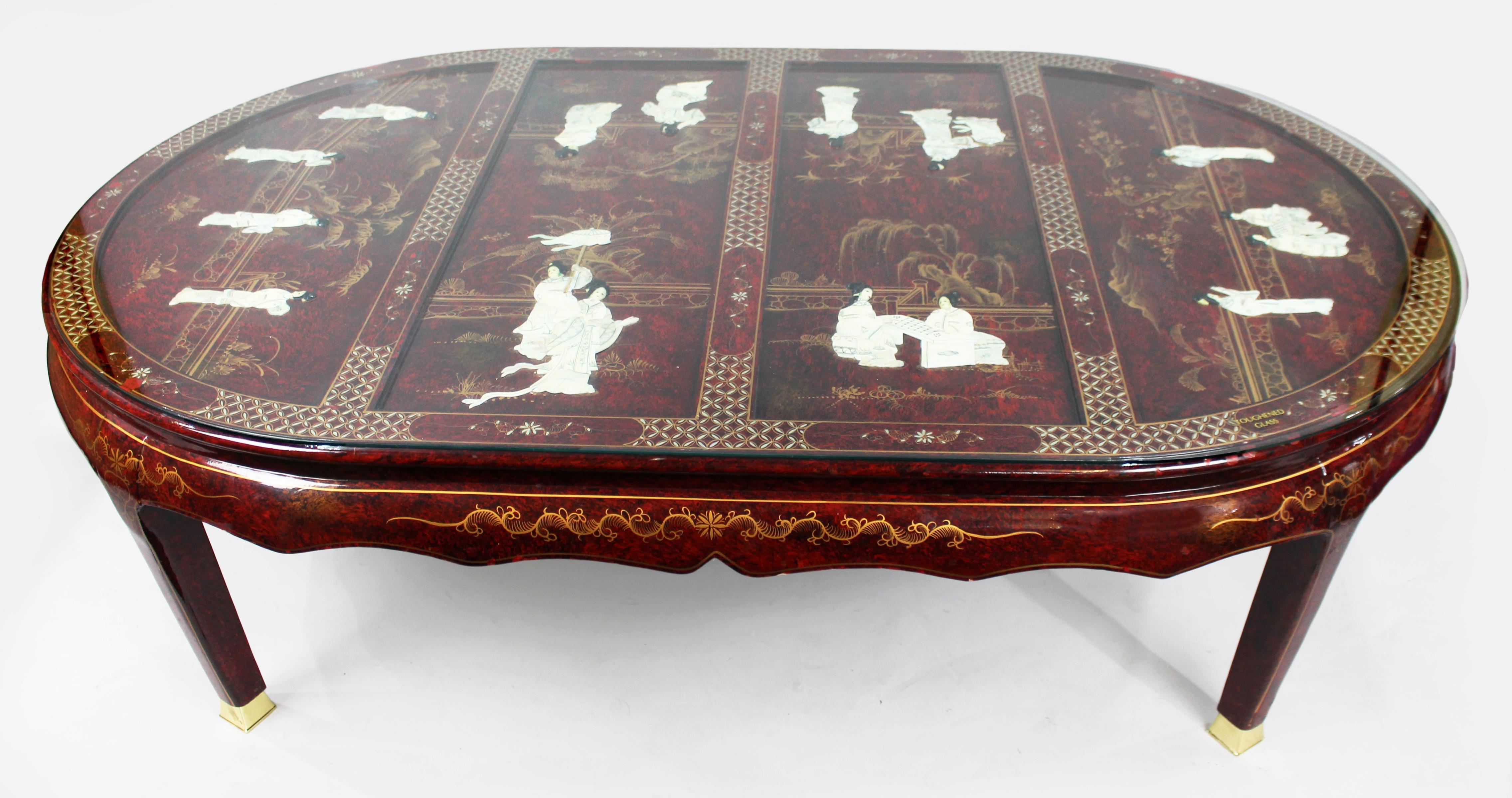 Large Vintage Chinese red lacquer coffee table


Chinese, late 20th century

Red lacquer body with hand painted mother of pearl style decoration, raised figures and gilt work. Brass capped feet. Glass top

Measures: Width: 187 cm

Depth: