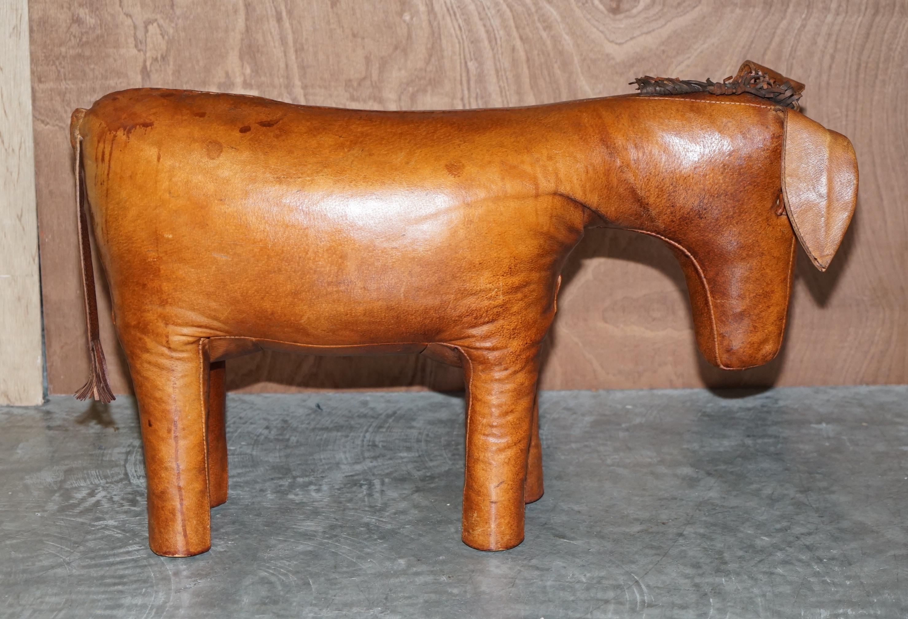 We are delighted to offer for sale this absolutely sublime circa 1940's Abercrombie & Fitch brown leather hand dyed Donkey or Pony footstool.

These come in varying sizes there is a quite unpractical extra-large size which is around a meter wide