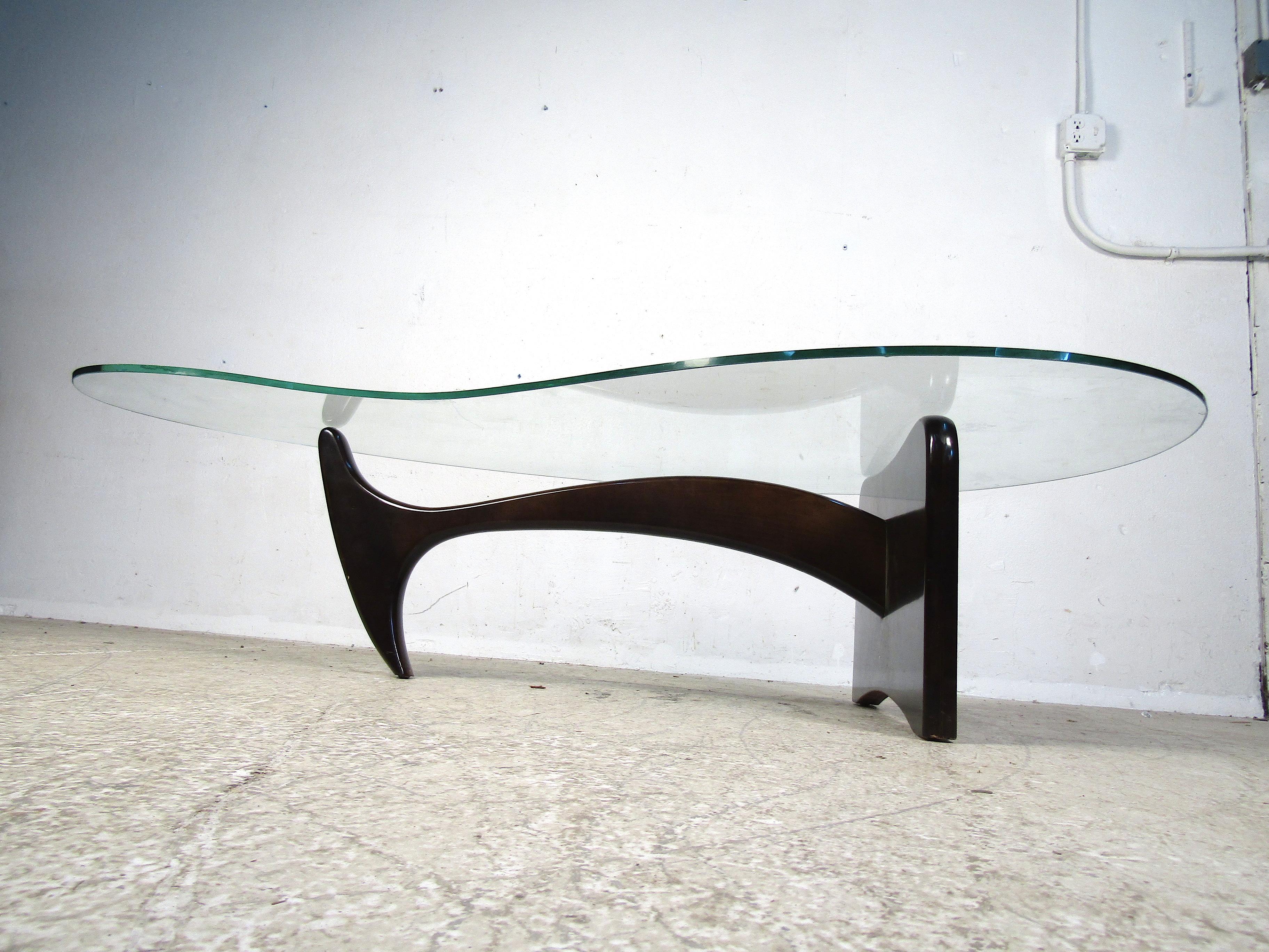 kidney shaped coffee table with glass top