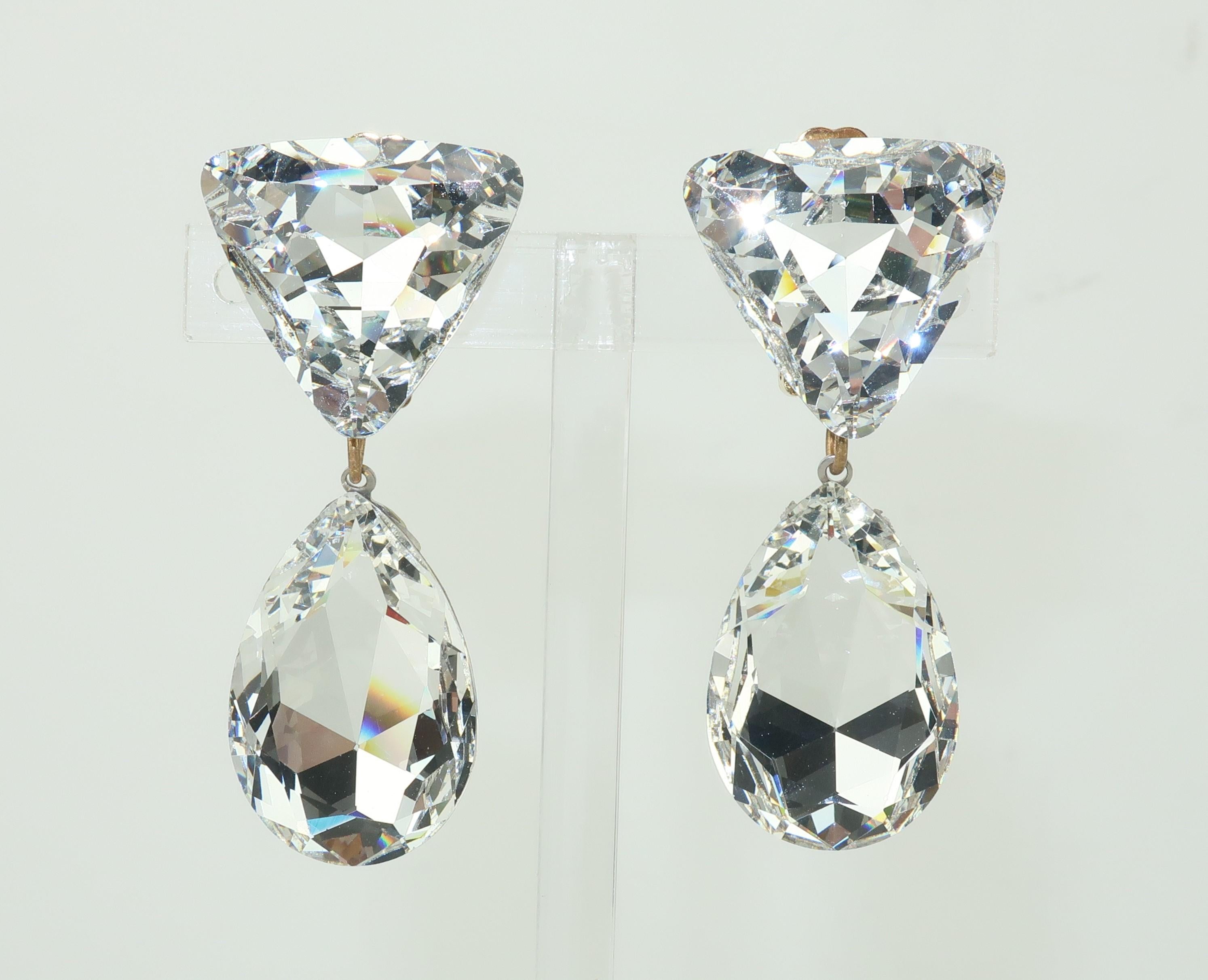 Diamonds might be a girl's best friend but crystals are her favorite sidekick!  These 1980's large crystal dangle earrings are dazzling and delightful ... sure to put a glamorous touch on any evening ensemble.  The gold tone clip on hardware keeps