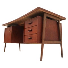 Large vintage Danish design boomerang desk made of teak