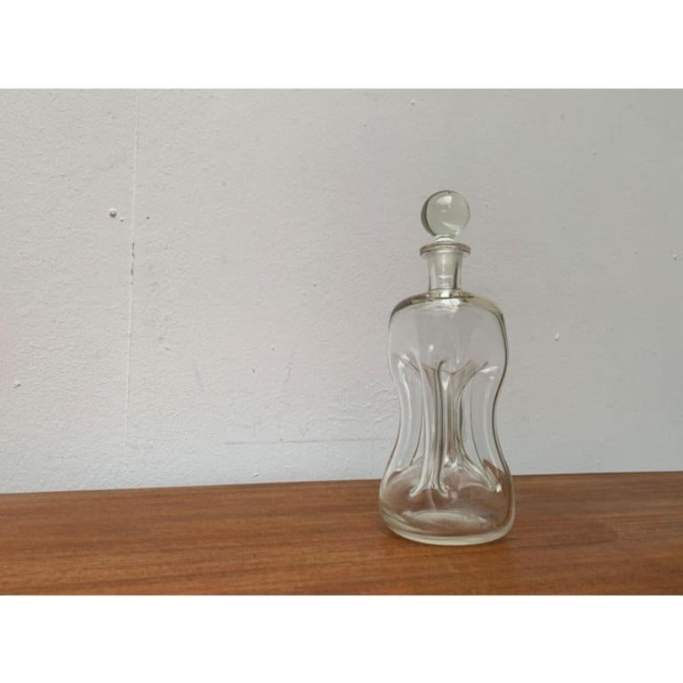 Grande bouteille vintage danoise en verre Kluk Kluk de Holmegaard, années 1970, en très bon état. Vintage By 1970 to 1979 preuve officielle d'authenticité telle que les catalogues d'époque, les dossiers des créateurs ou d'autres sources