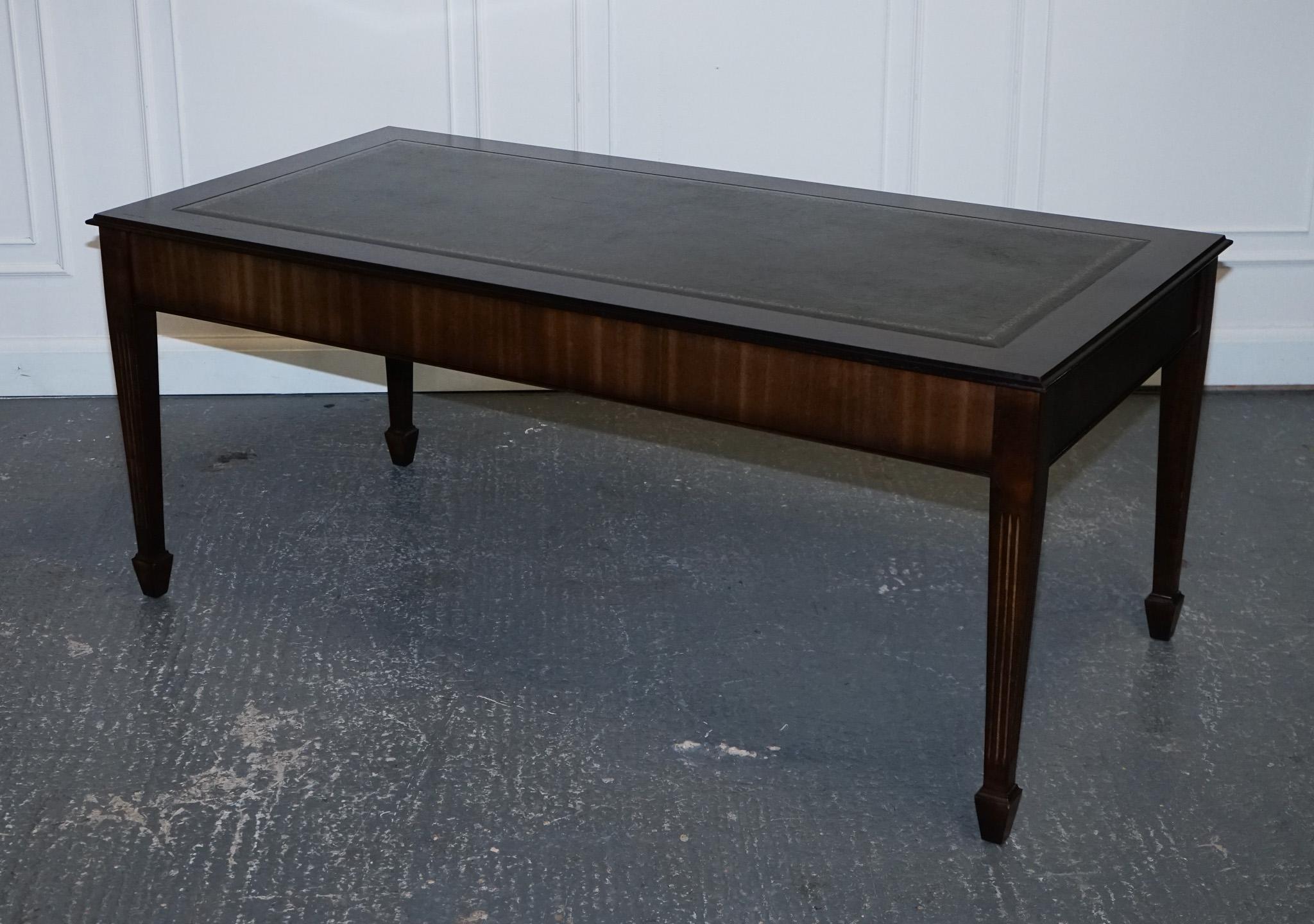 
We are delighted to offer for sale this Large Writing Table Desk With Dark Green Embossed Leather Top.

A well-made desk, large enough for two people, or for doing big drawings, projects etc.

Legs can be removed for easier manoeuvring in your
