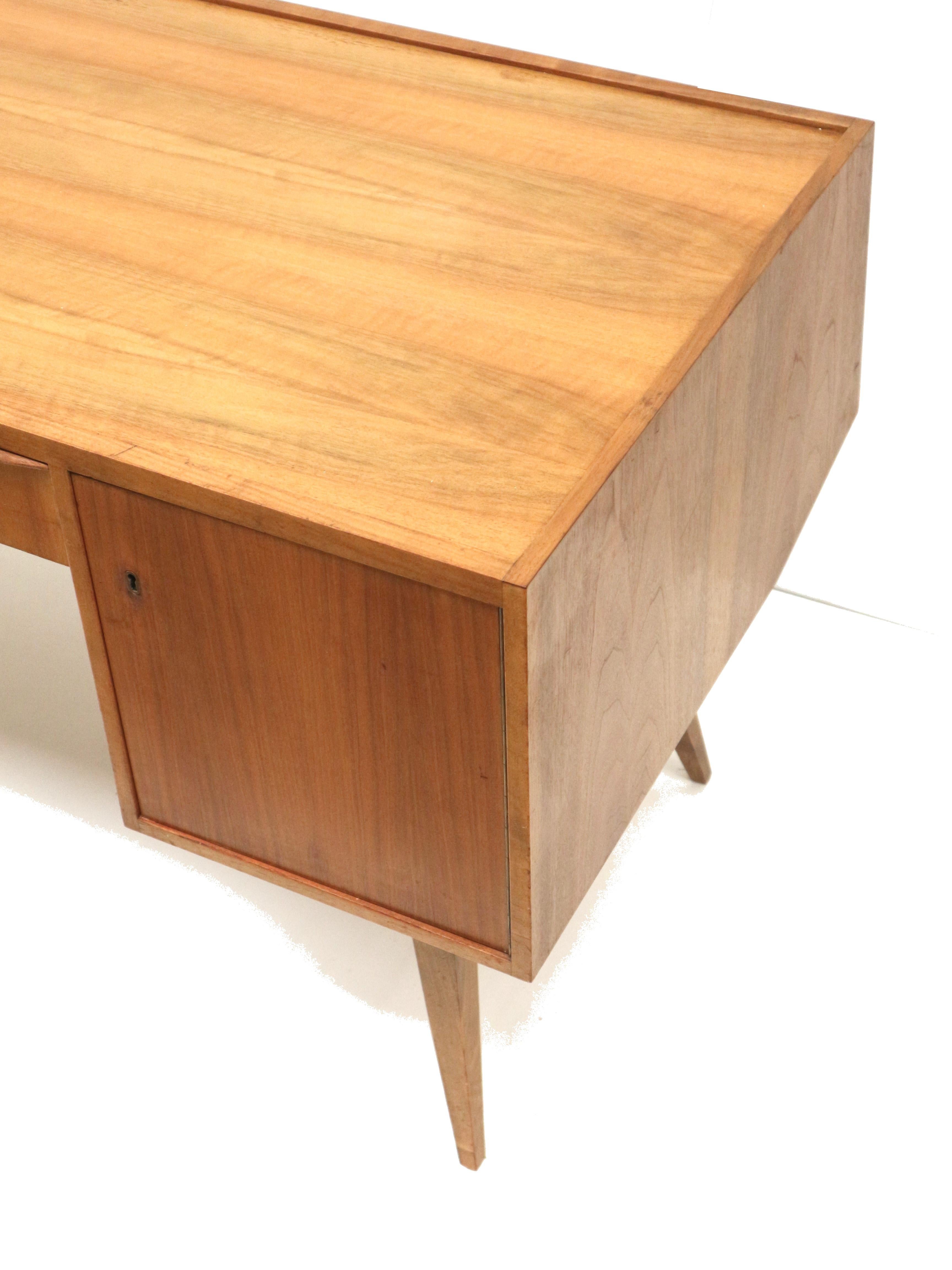 Wood Large vintage desk with slanted legs made in the 70s For Sale