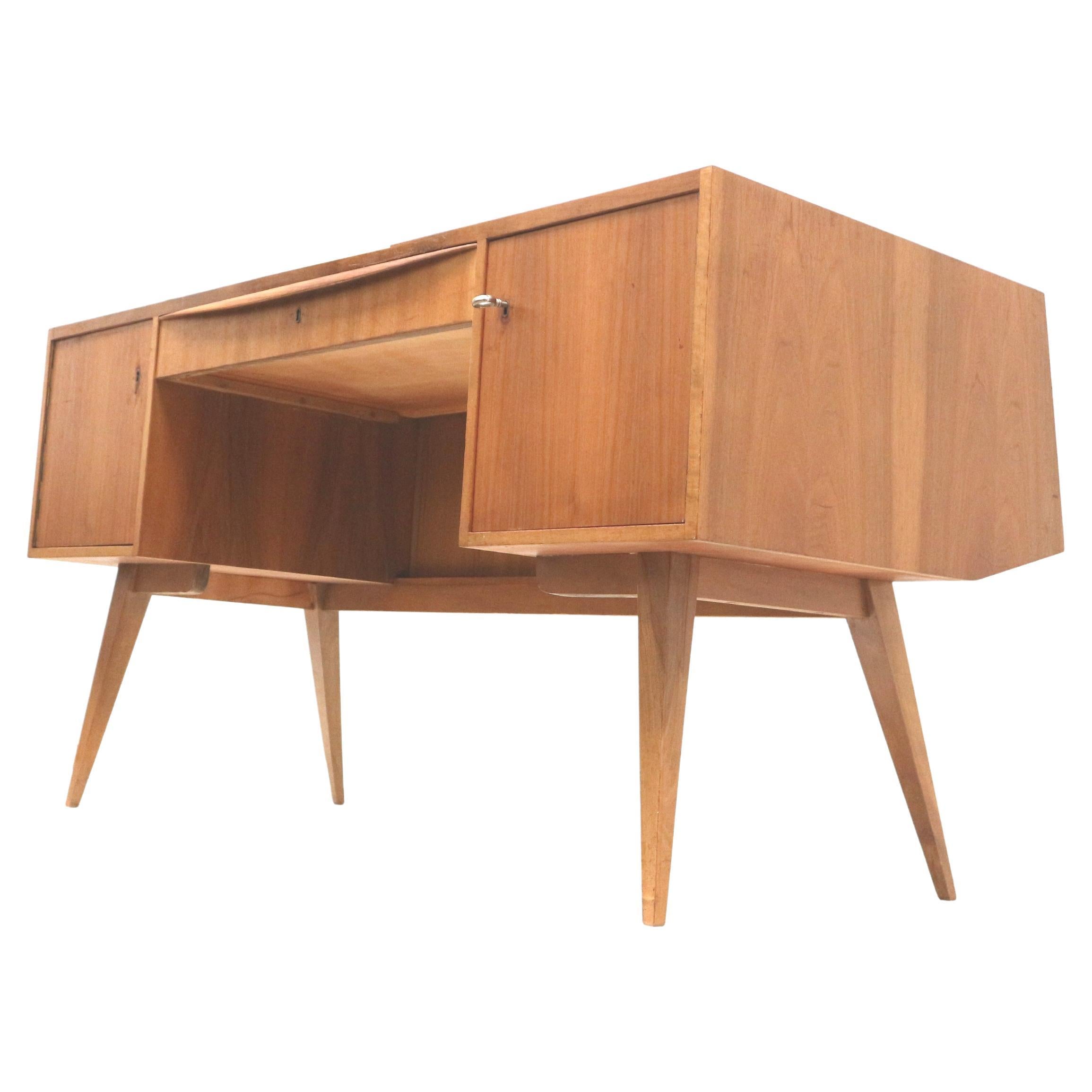Large vintage desk with slanted legs made in the 70s