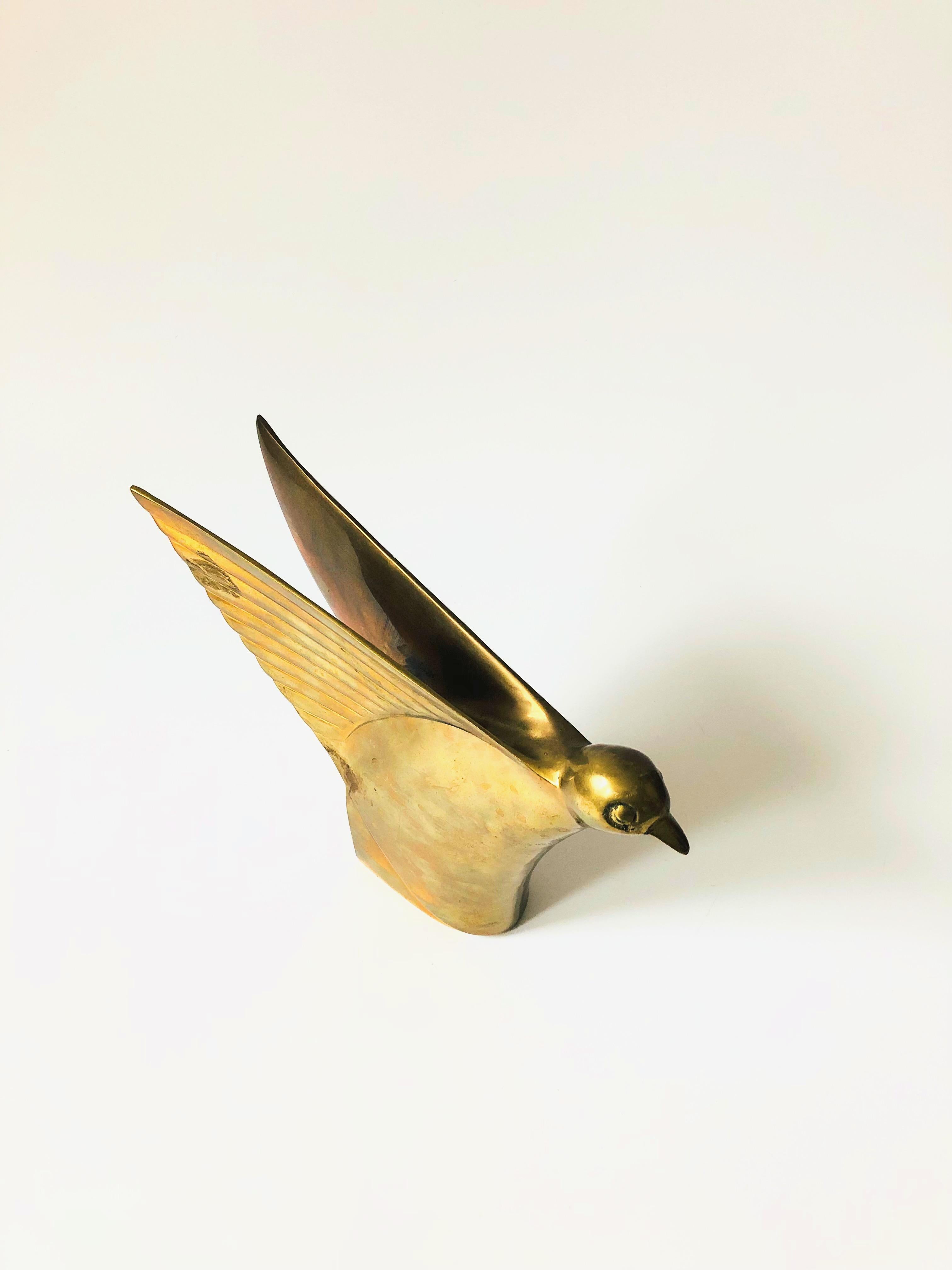 dolbi cashier brass bird