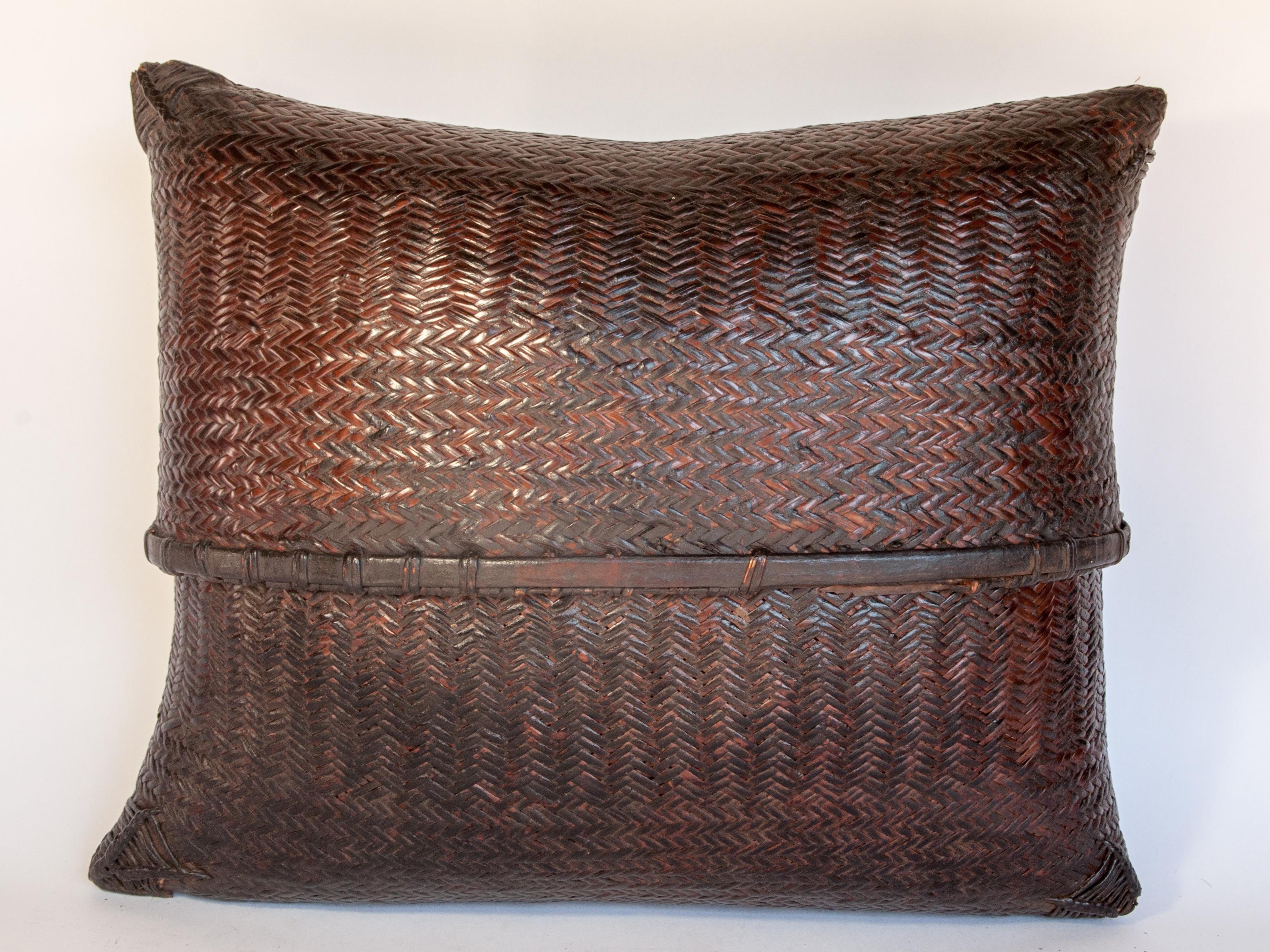 Large vintage double weave tribal pouch basket from the Nepal Himal, mid-20th century
This rustic pouch comes from the Himalayan Foothills of Nepal. Made by hand from bamboo in a strong double weave construction, it's robust quality mirrors the