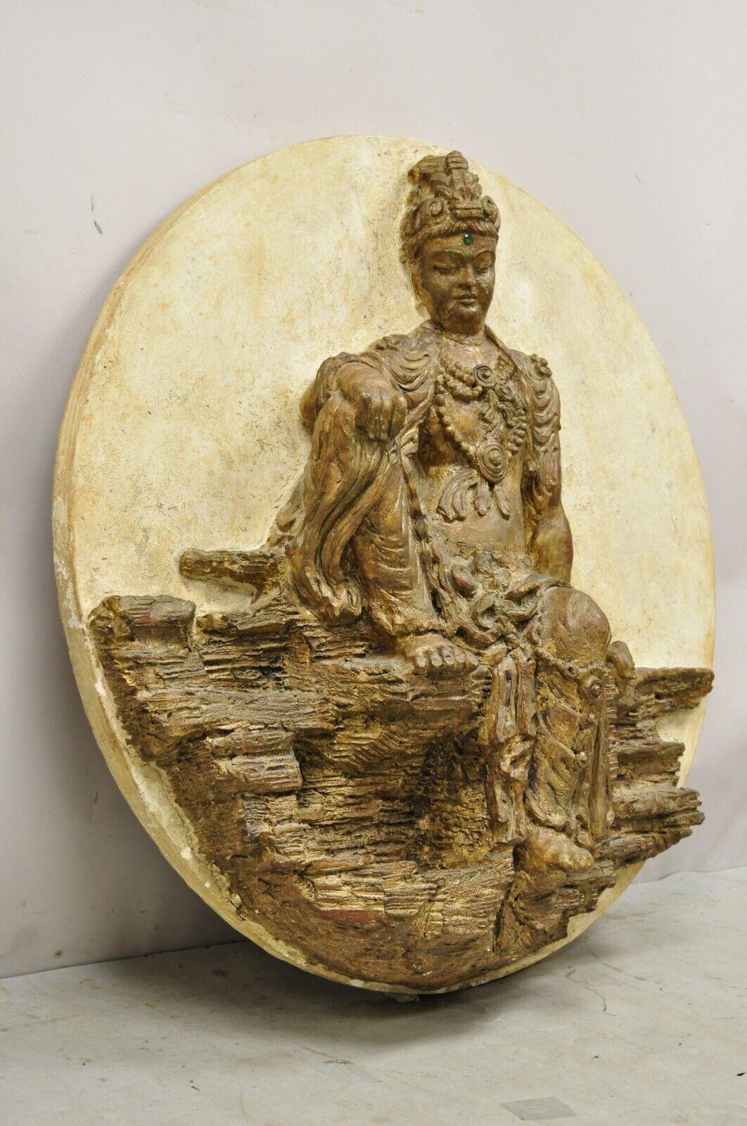 Large Vintage Fiberglass Kuan Shih Yin Buddha Relief Round Wall Art Sculpture. item featured is a large impressive form, remarkable details, small cubby under foot, nice distressed finish, approx 60 lbs.. Circa Late 20th Century. Measurements: 43