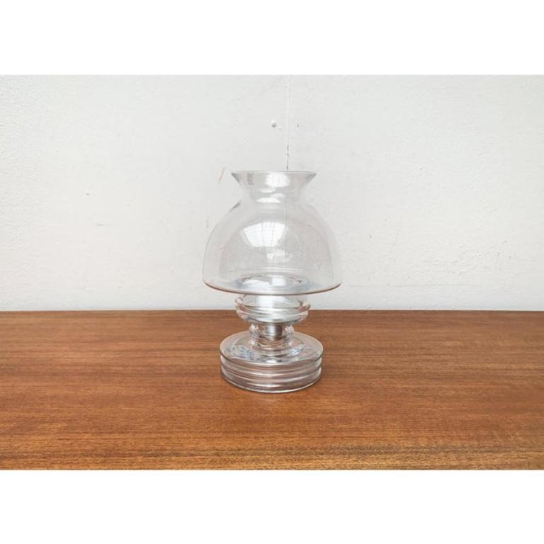 Grand bougeoir vintage en verre Apollo de Nanny Still pour Riihimäen Lasi, 1970, en très bon état. Conçue de 1970 à 1979 Cette pièce porte une marque d'attribution.

Informations complémentaires :
Matériaux : Verre, métal
Pays d'origine :