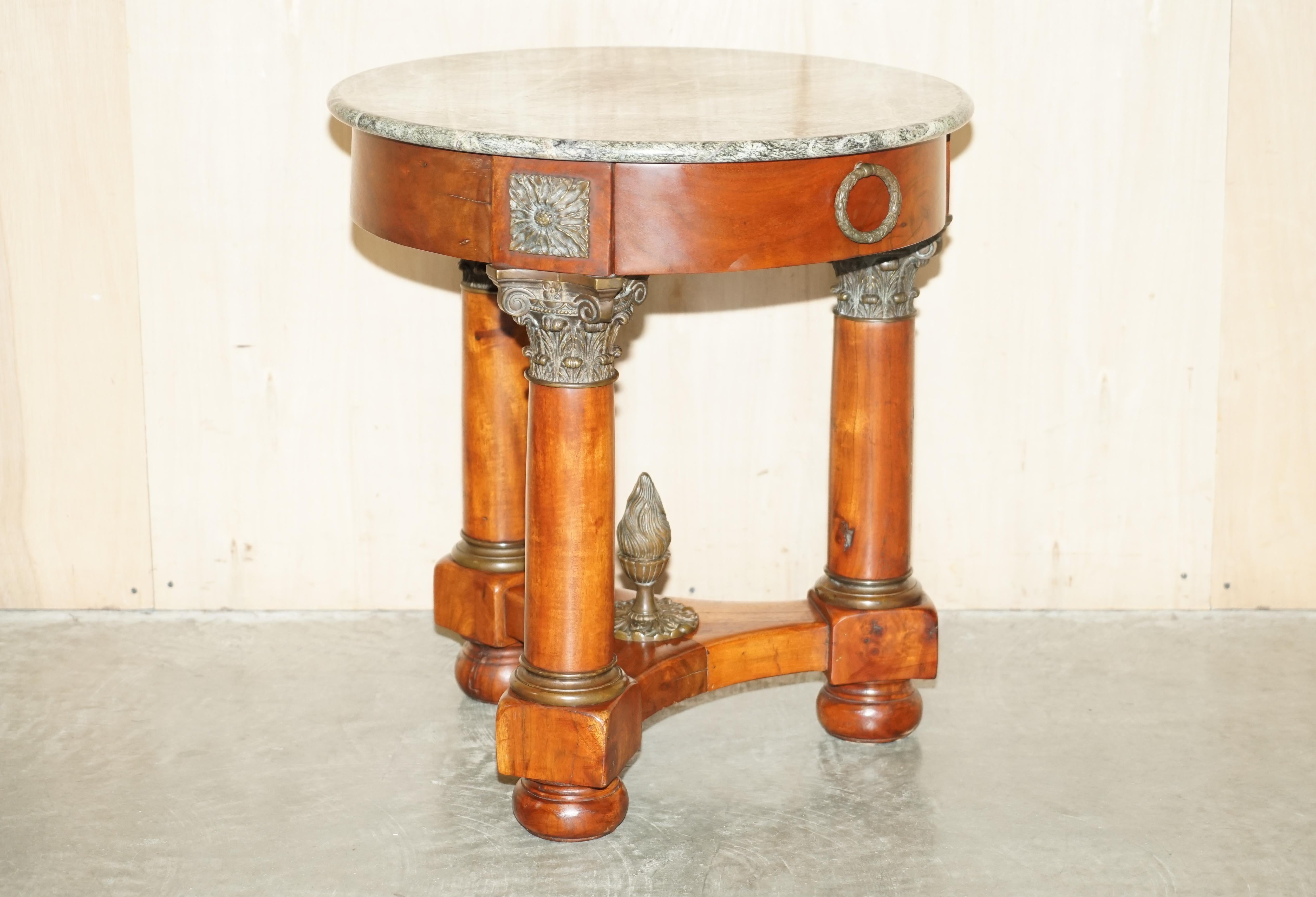 We are delighted to offer for sale this very decorative, hand made in France, large side table or small occasional table with thick marble top and bronzed gilt brass fixtures 

Please note the delivery fee listed is just a guide, it covers within