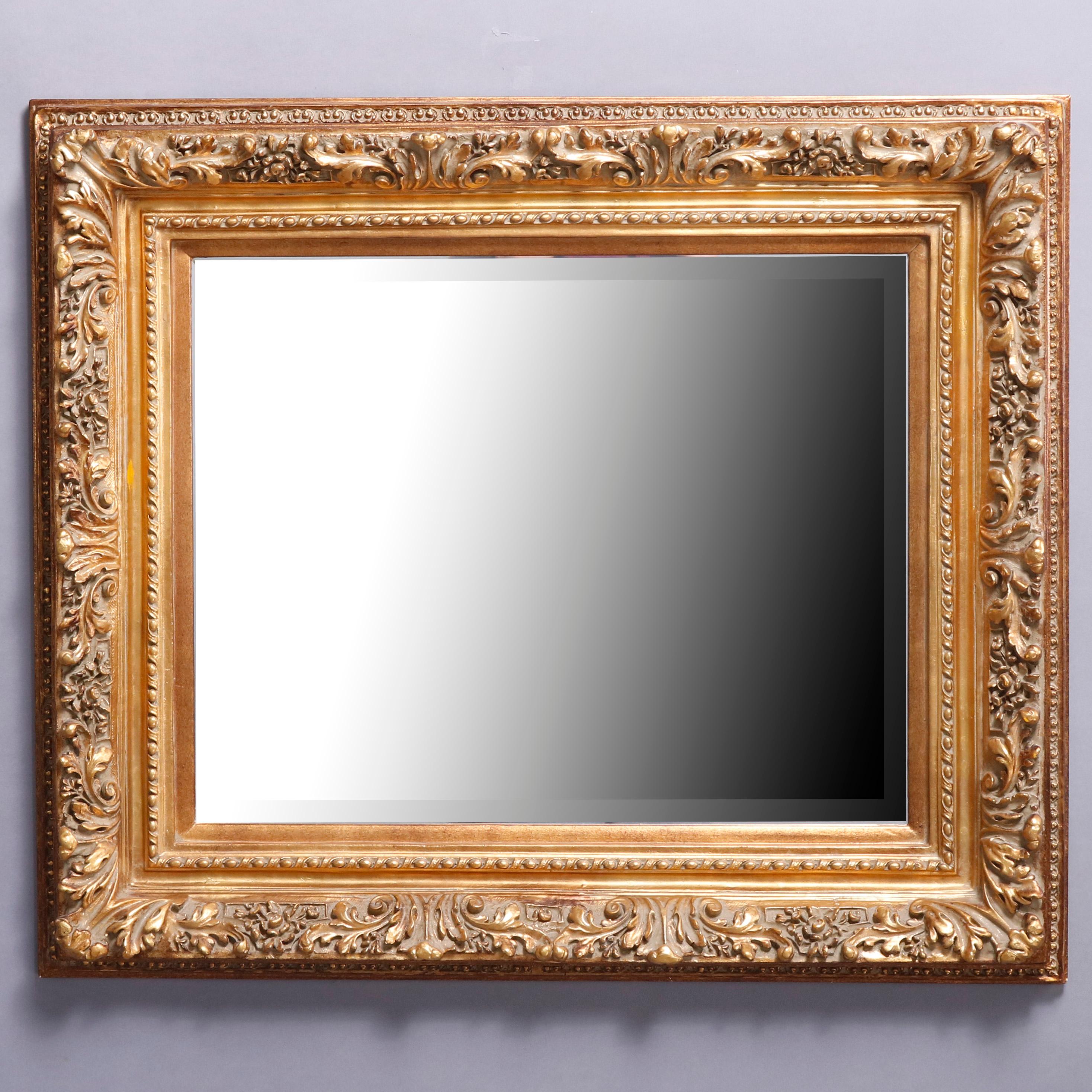 A large vintage French giltwood framed wall mirror offers scroll and foliate surround with beveled mirror, 20th century

***DELIVERY NOTICE – Due to COVID-19 we are employing NO-CONTACT PRACTICES in the transfer of purchased items.  Additionally,