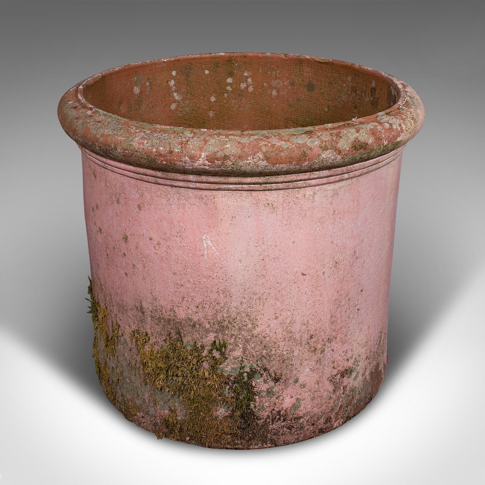 
This is a large vintage garden planter. An Italian, terracotta outdoor jardiniere pot, dating to the late 20th century, circa 1970.

Superb proportion and a pleasingly time worn appearance
Displays a desirable aged patina throughout
Terracotta form