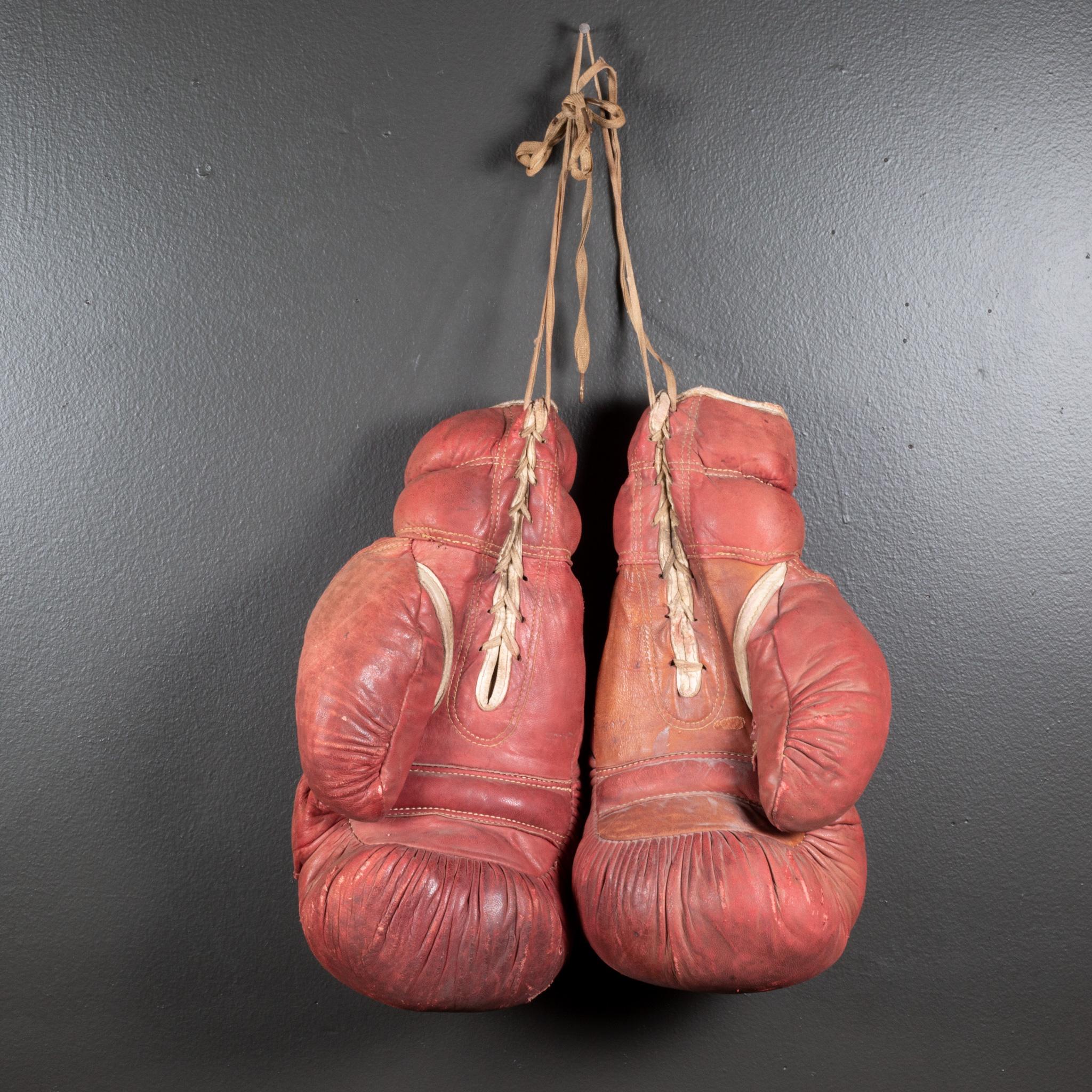 ABOUT

Original leather boxing gloves filled with horse hair. The leather is very soft and in good condition. .

    CREATOR Wilson Sporting Goods.  
    DATE OF MANUFACTURE c.1950-1960.
    MATERIALS AND TECHNIQUES Suede, Horse Hair.
    CONDITION