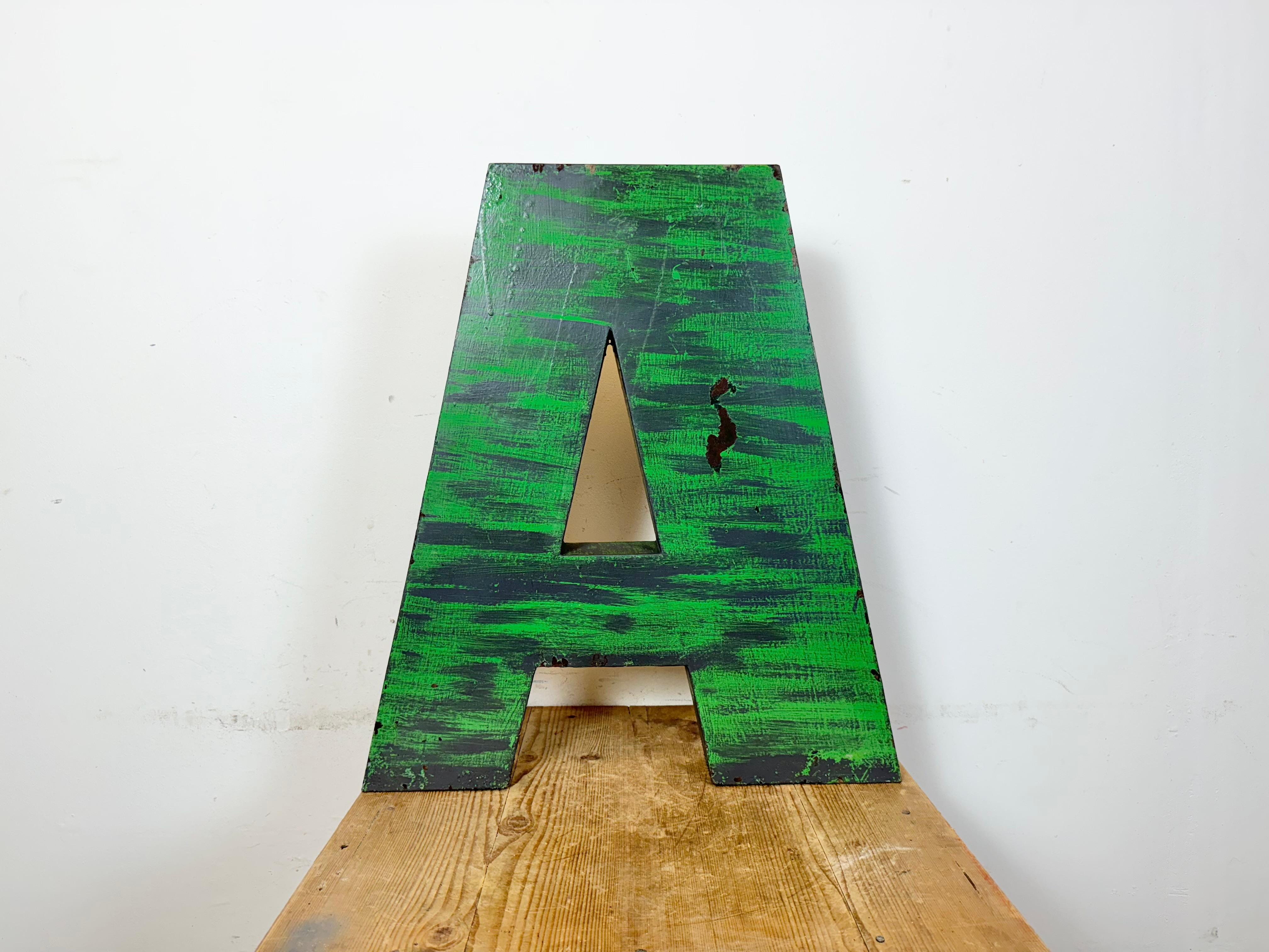 This vintage industrial facade letter “ A “was made during the 1970s in former Czechoslovakia and comes from an old advertising banner. The weight of the letter is 7 kg.