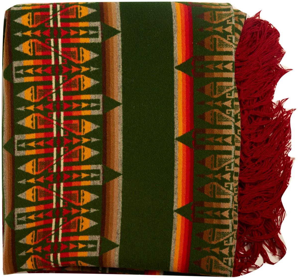 Large vintage green Pendleton blanket with fringe in Navajo-style.
