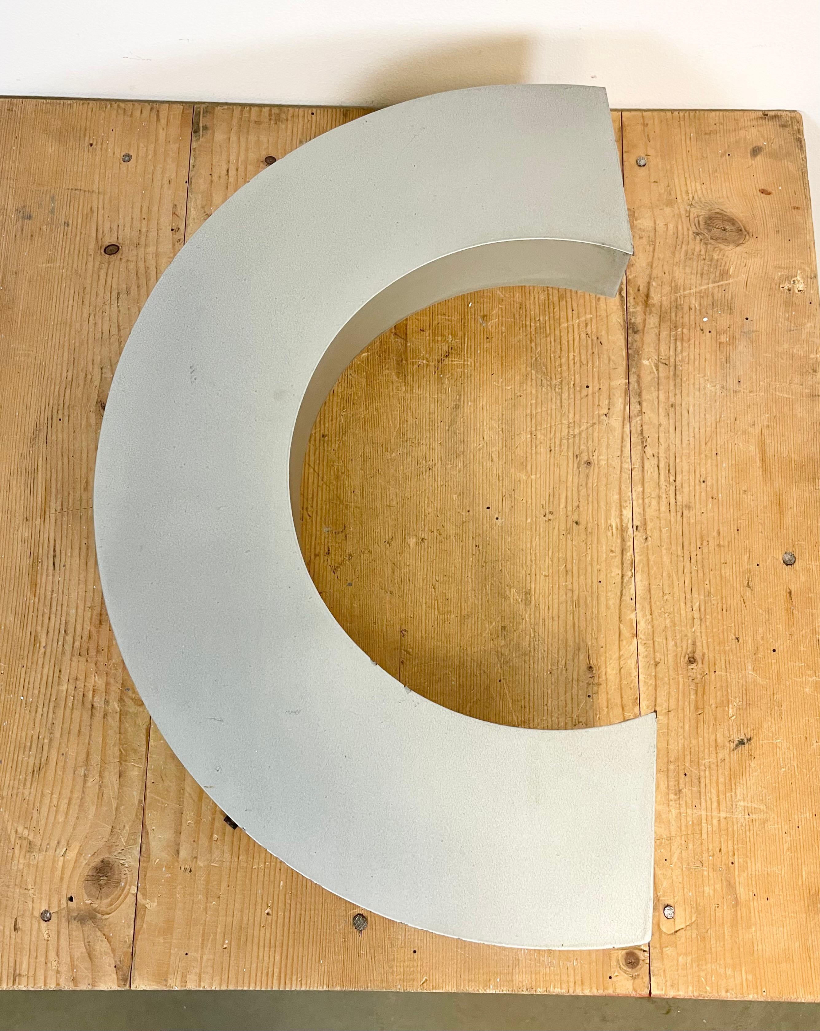 This vintage industrial facade letter “C” was made during the 1970s in Italy and comes from an old advertising banner. The weight of the letter is 1,5 kg.