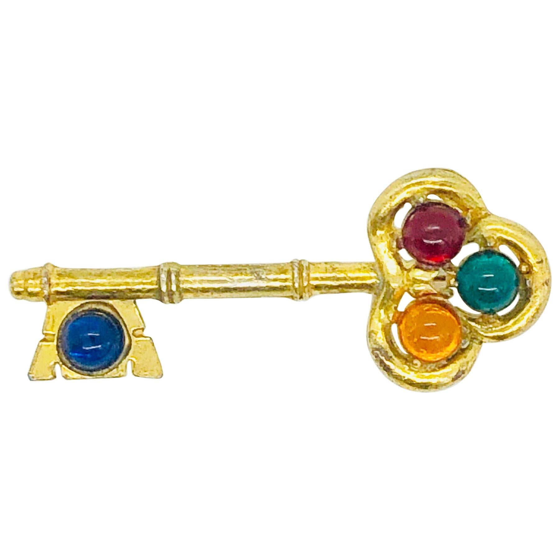 Grande broche vintage Gripoix à clé fantaisie en or bleu, rouge, vert et orange en vente