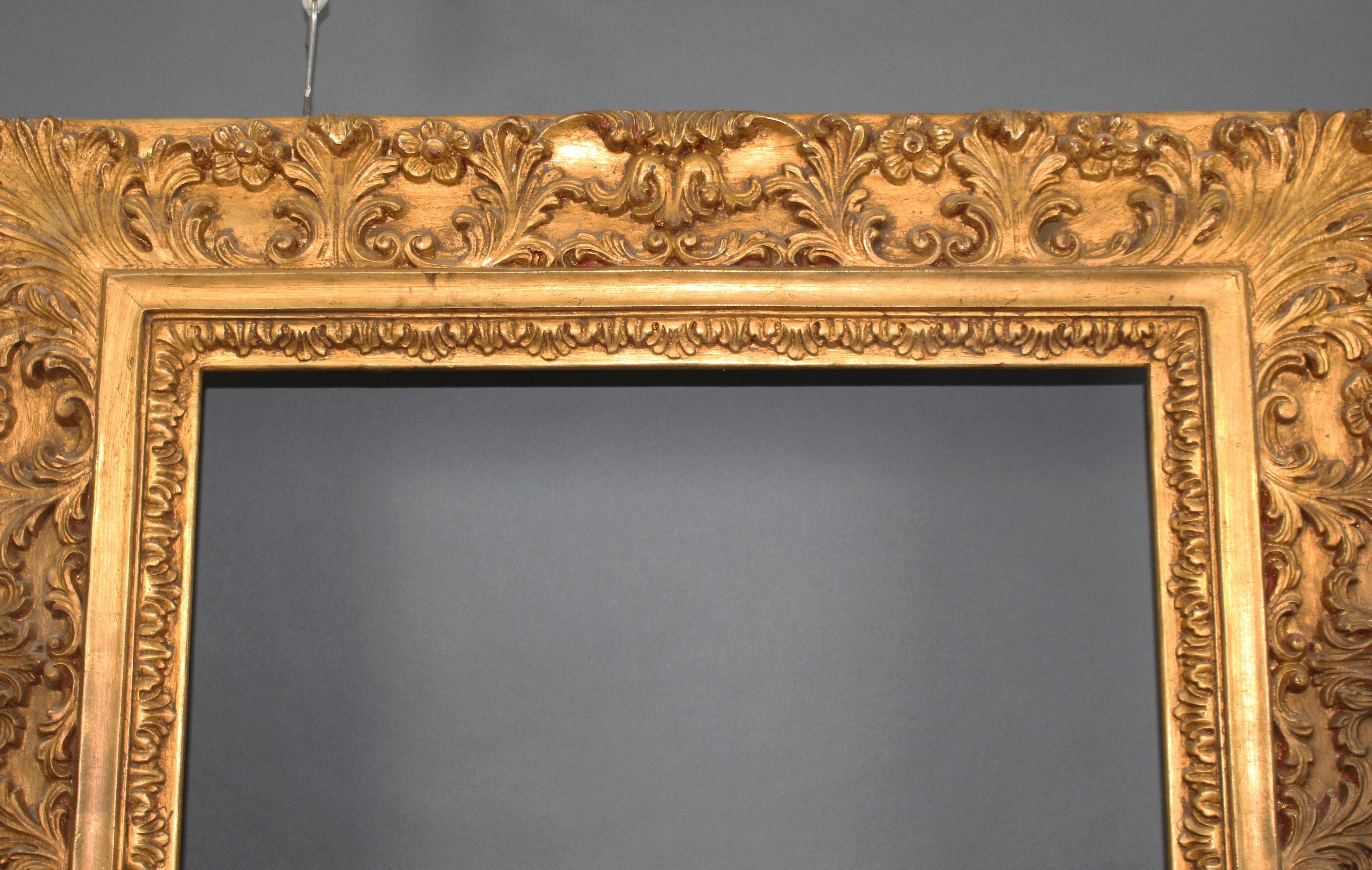 Period mid-late 20th century, antique style, Italian
Frame size 105 x 122 cm / 41 1/4 x 48 in
Interior (size of picture) 70.5 x 86 cm / 27 3/4 x 33 3/4 in
Composition carved wood
Finish gold leaf on red bole
Condition: Good condition