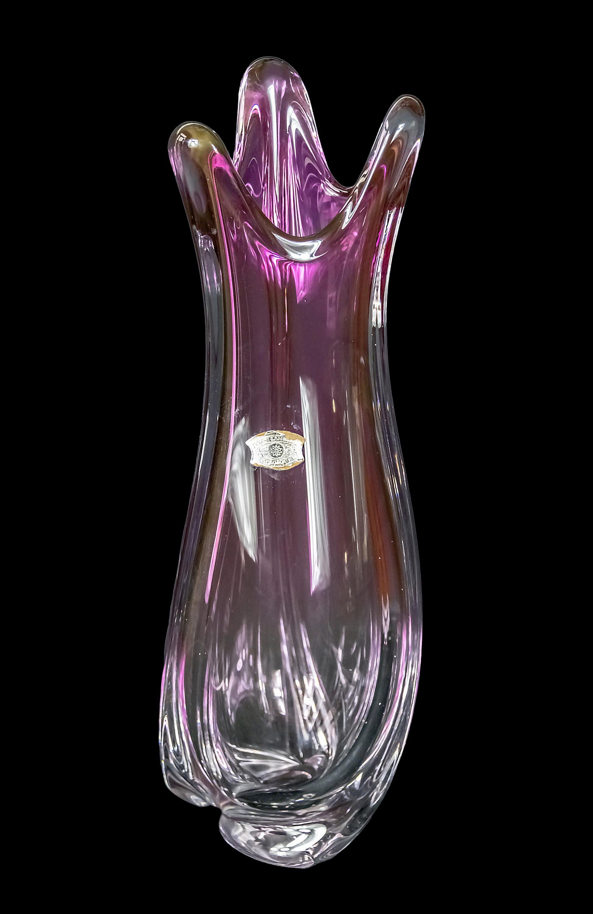 Large and heavy handmade Val Saint Lambert crystal vase created in asymmetric twisting shape and clear to fuchsia pink colour.
The vase is heavy and solid.
Labeled.
